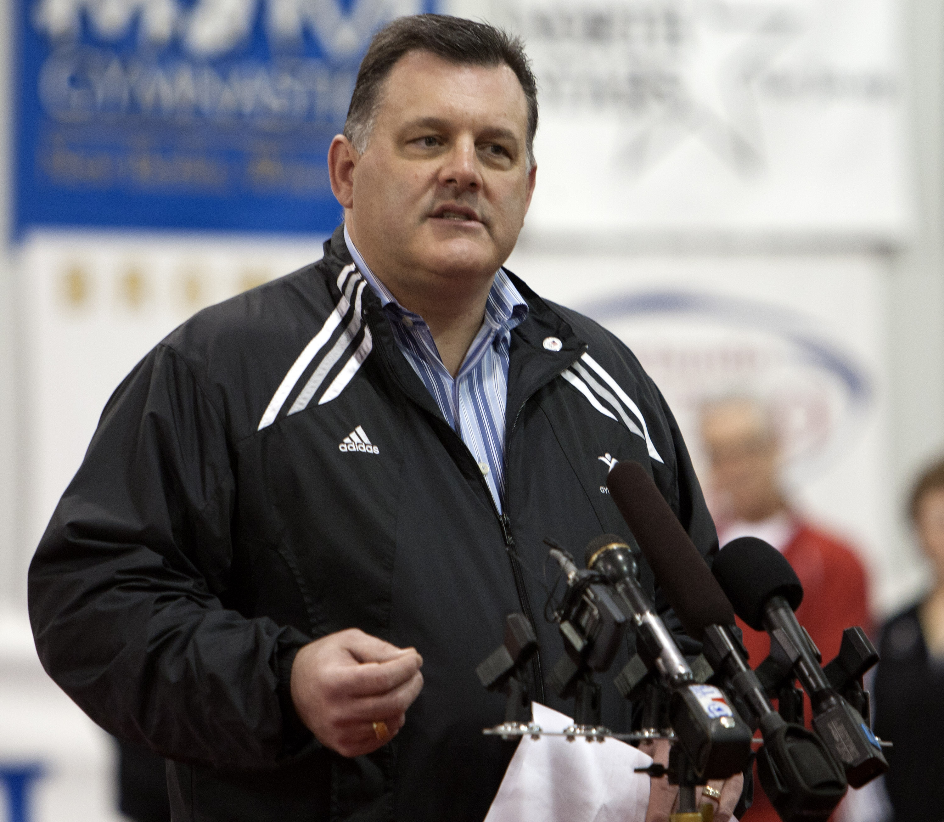 HUNTSVILLE, TX - JANUARY 26: Steve Penny, President of USA Gymnastics welcomes guests and media and to announce the USOC designation of the USA Gymnastics National Training Center at Karolyi Ranch as an Official U.S. Olympic Training Site and Hilton's partnership with USA Gynastics and title sponsorship of Team Hilton on January 26, 2011 in Huntsville, Texas. (Photo by Bob Levey/Getty Images for Hilton)
