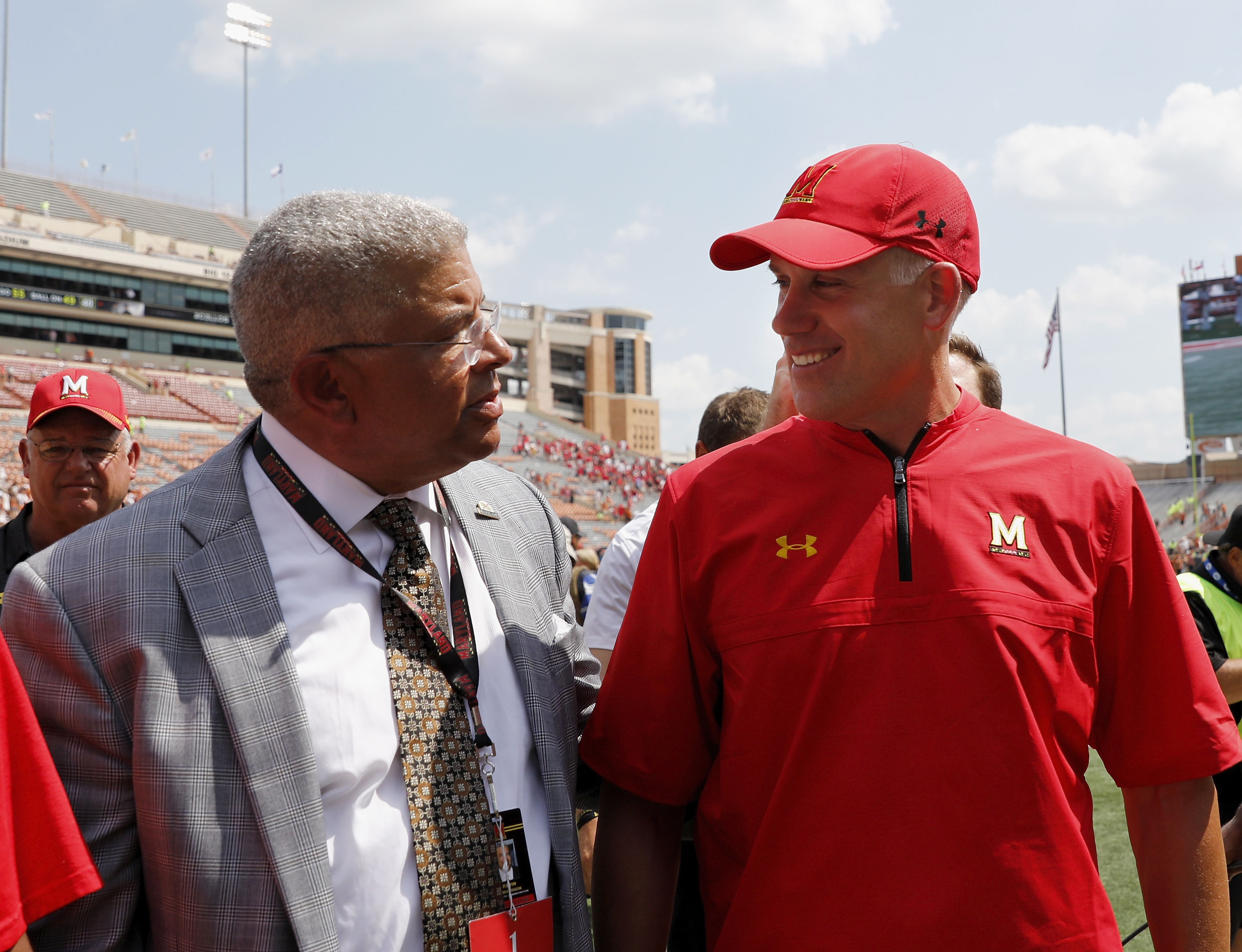 AUSTIN, TX - SEPTEMBER 02: Head coach D.J. Durkin of the Maryland Terrapins and athletic director Kevin Anderson walk off the field after defeating the Texas Longhorns at Darrell K Royal-Texas Memorial Stadium on September 2, 2017 in Austin, Texas. (Photo by Tim Warner/Getty Images)