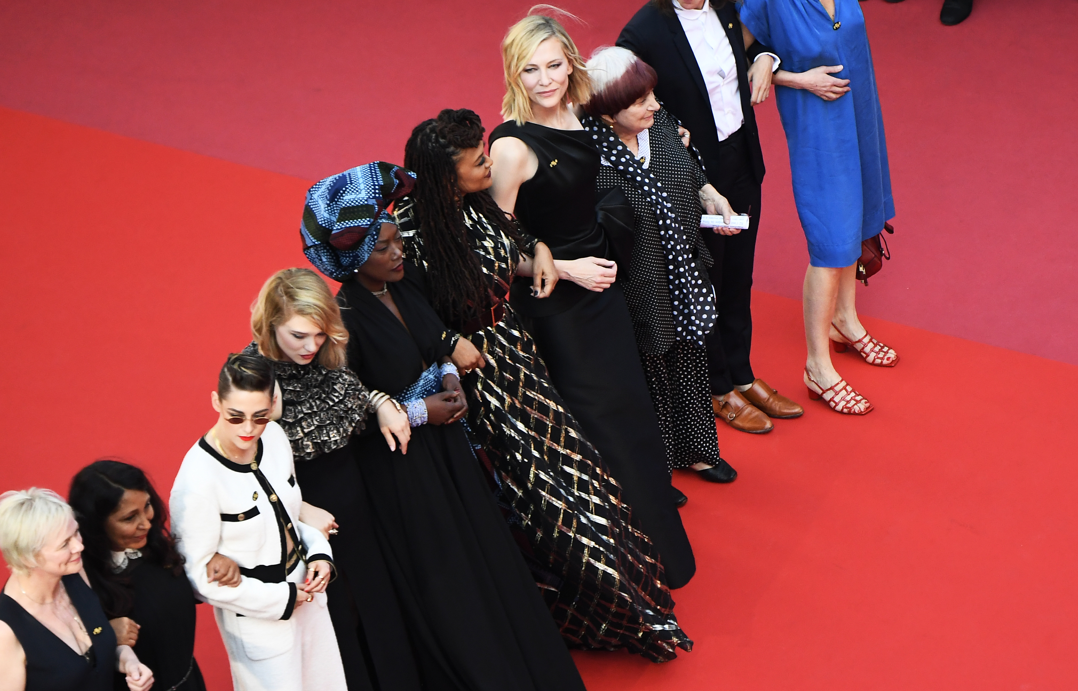 Kristen Stewart, Burundian, Khadja Nin, Ava DuVernay, Cate Blanchett and French director Agnes Varda walk the red carpet in protest of the lack of female filmmakers honored throughout the history of the festival at the screening of "Girls Of The Sun (Les Filles Du Soleil)" during the 71st annual Cannes Film Festival at the Palais des Festivals on May 12, 2018 in Cannes, southeastern France. CREDIT: ANNE-CHRISTINE POUJOULAT/AFP/Getty Images