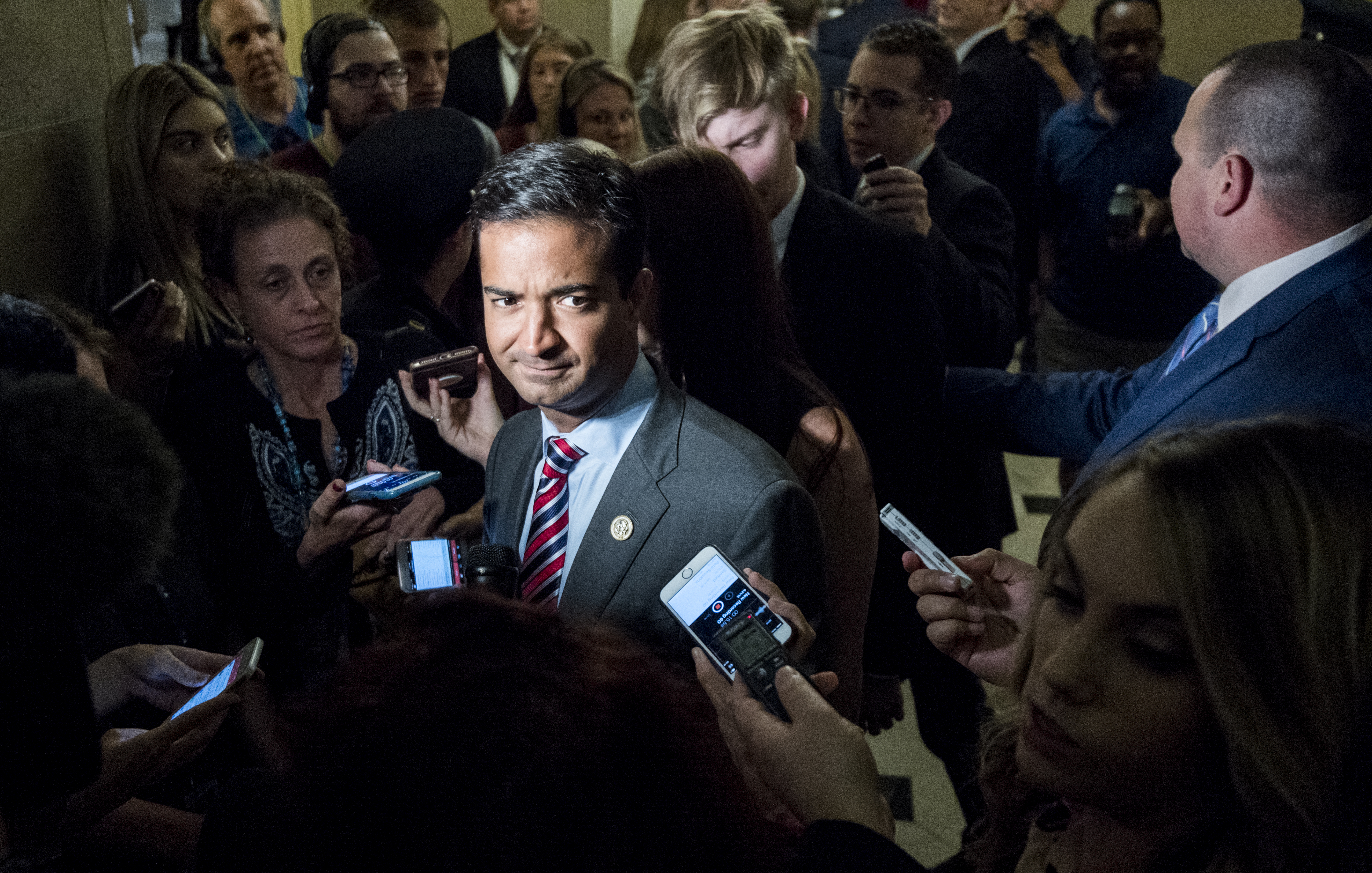 Rep. Carlos Curbelo, R-Fla., speaks with reporters as he leaves Speaker Ryan's office on Thursday, June 21, 2018, as House GOP leadership tries to find a path to pass immigration legislation. CREDIT: Bill Clark/CQ Roll Call