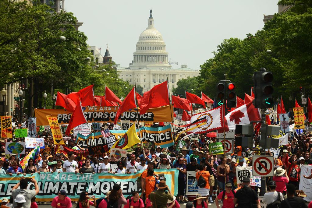 People march in Washington DC to protest President Trump's anti-climate policies. April 29, 2017. CREDIT: Astrid Riecken/Getty Images.