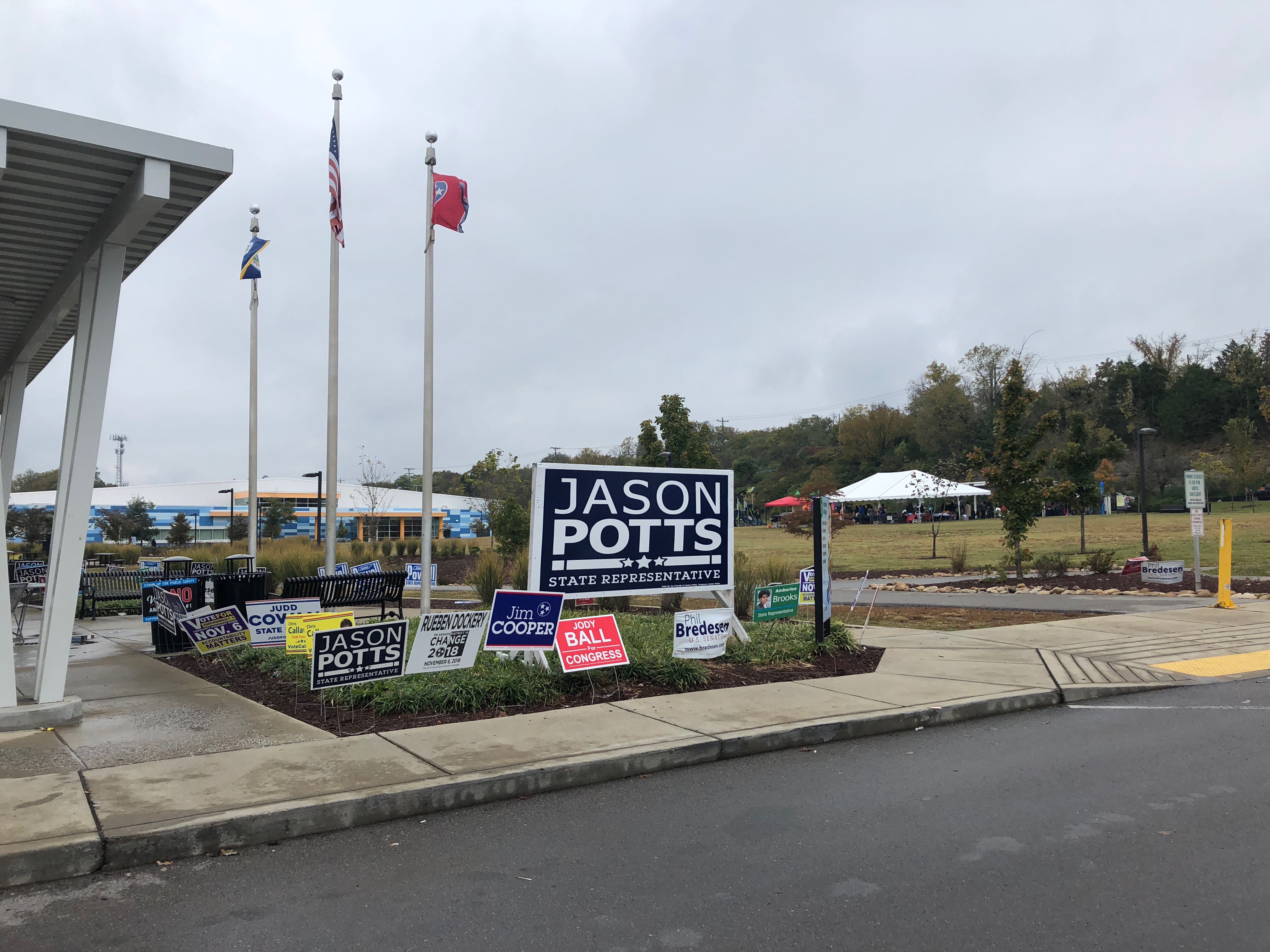 Signs posted outside the library where early voting was being held Saturday. CREDIT: Addy Baird
