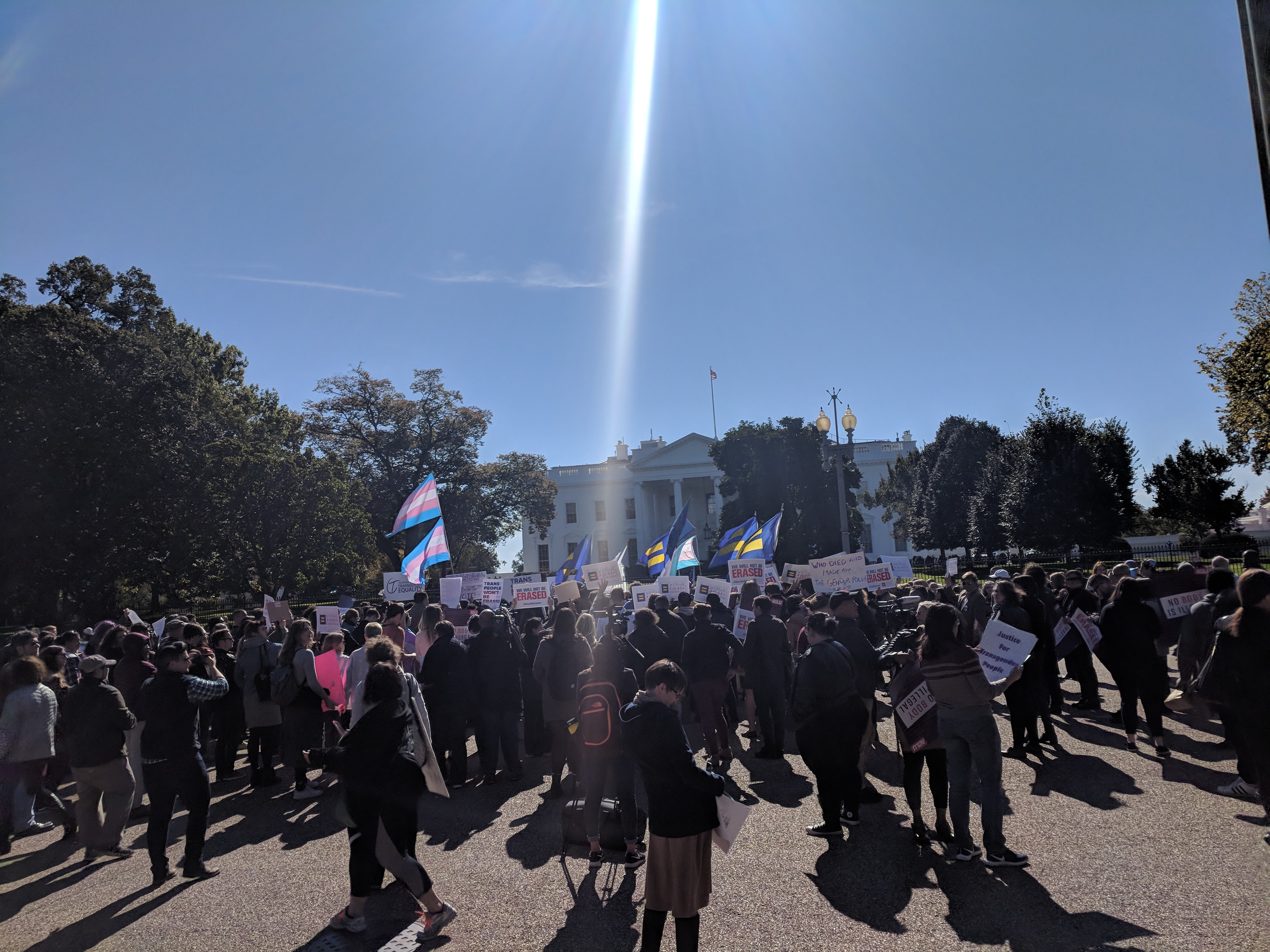 Dozens gathered Monday to protest a proposed policy to erase transgender people from federal nondiscrimination protections. CREDIT: Zack Ford/ThinkProgress