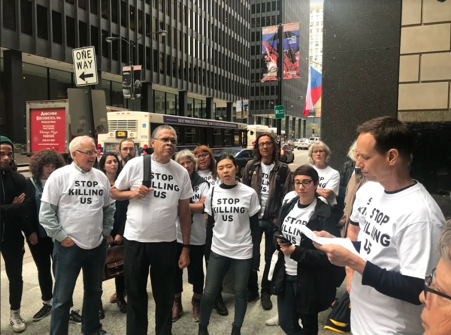 People gather outside the federal building in Chicago on October 1, 2018, to protest the EPA's proposed Affordable Clean Energy Rule. CREDIT: Tara Raghuveer/People's Action