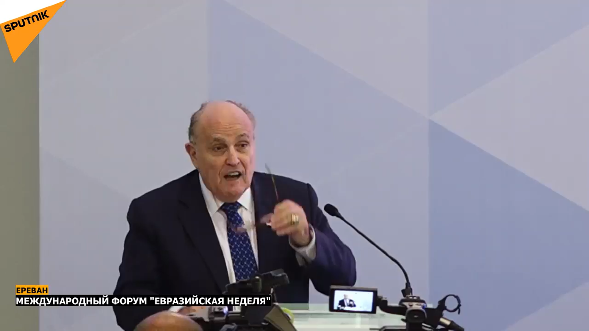 A screenshot of Giuliani's winding, rambling speech in Armenia.
