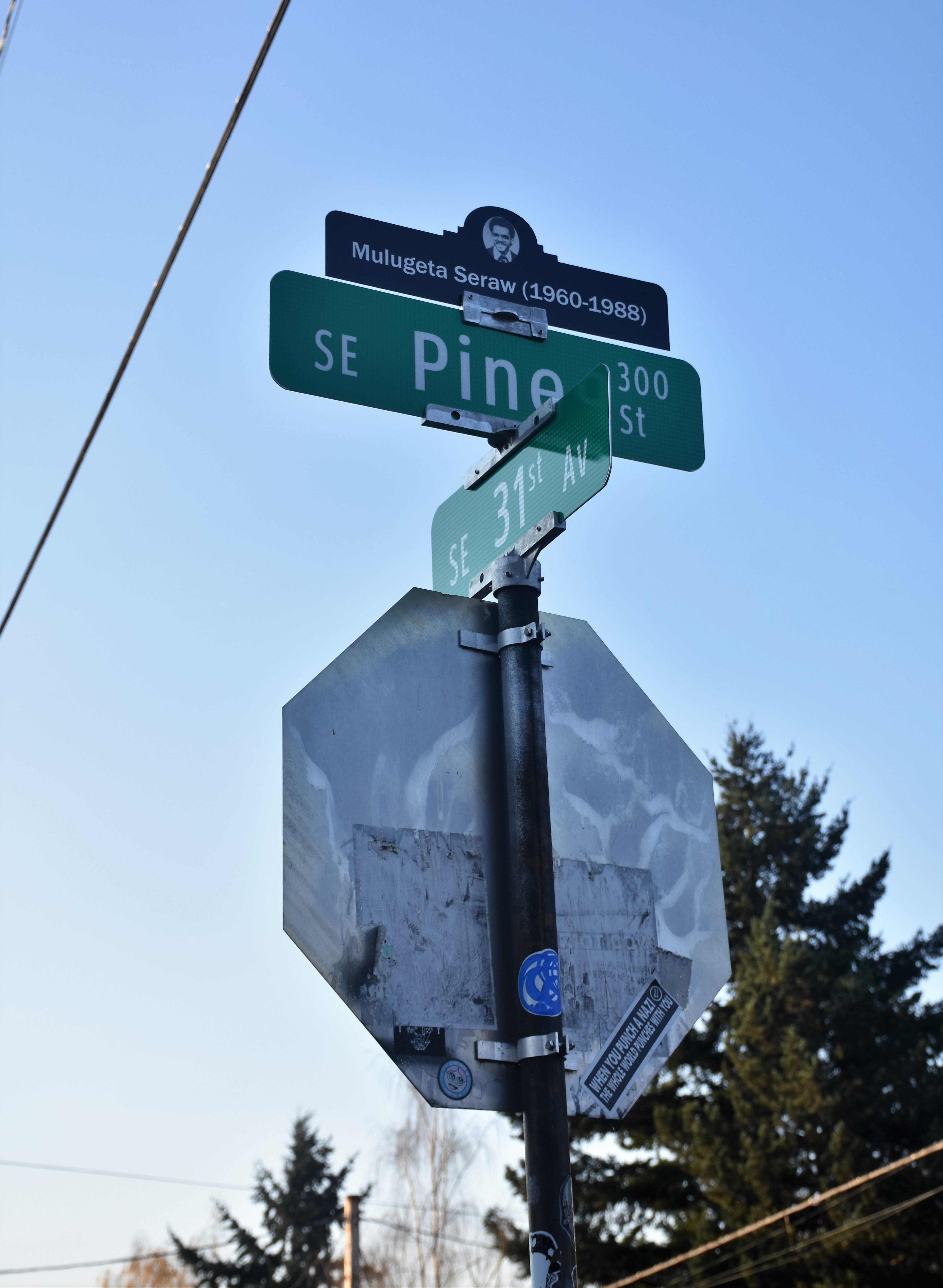 Mulugeta Seraw's name now sits atop the signs near where he lived, and where he died. CREDIT: CASEY MICHEL