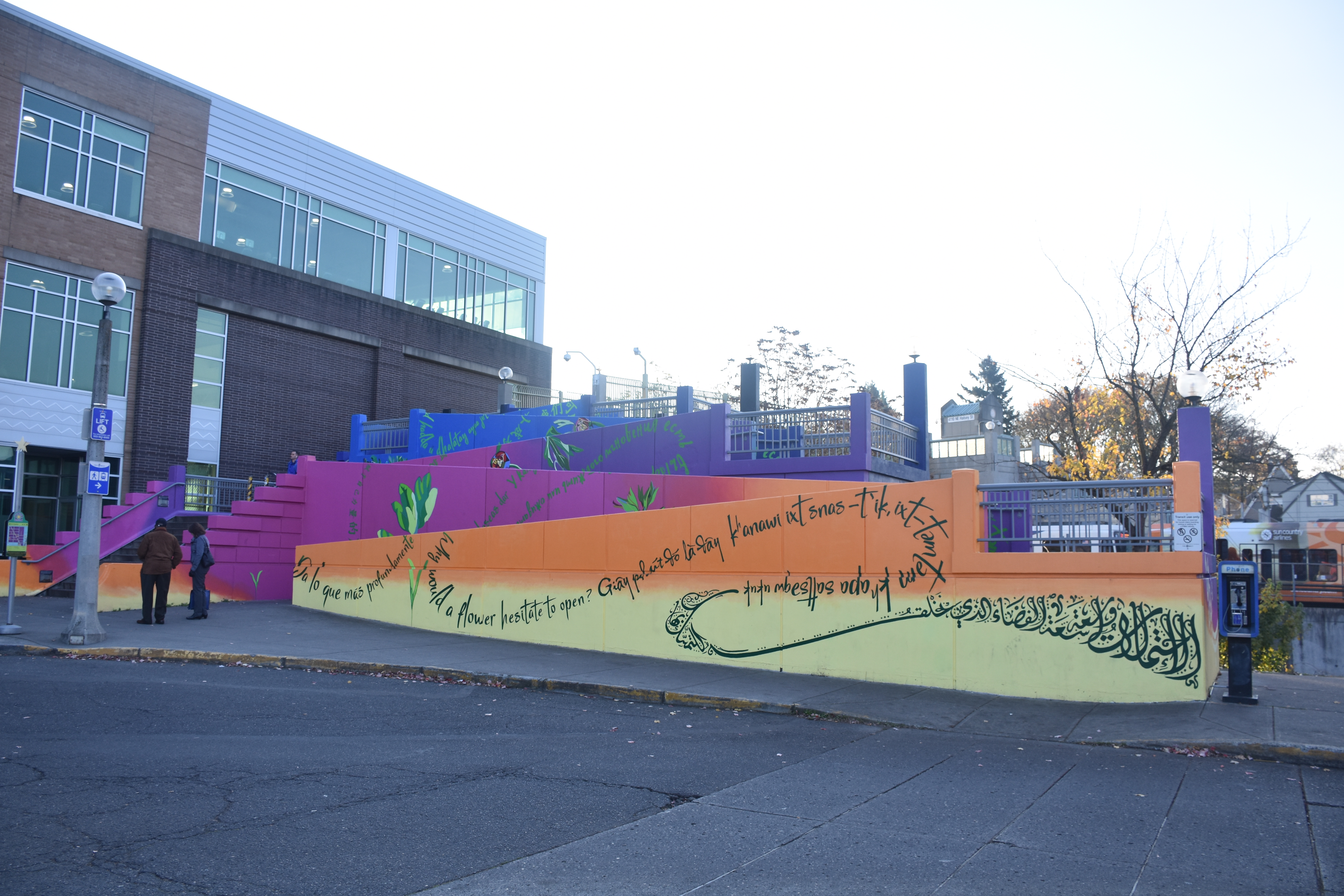 A mew mural honors the victims of Portland's 2017 stabbing attack, featuring quotes from Taliesin Myrddin Namkai-Meche and Ricky Best. CREDIT: CASEY MICHEL