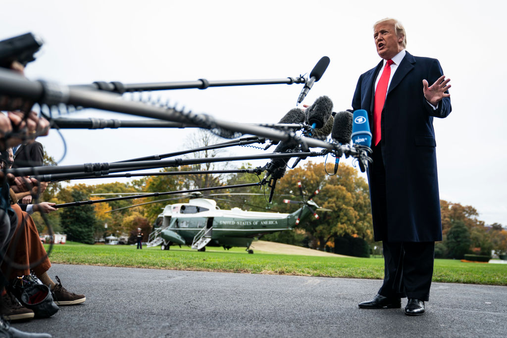 Donald Trump talks to reporters on the South Lawn of the White House on November 2, 2018. (Jabin Botsford/The Washington Post via Getty Images)