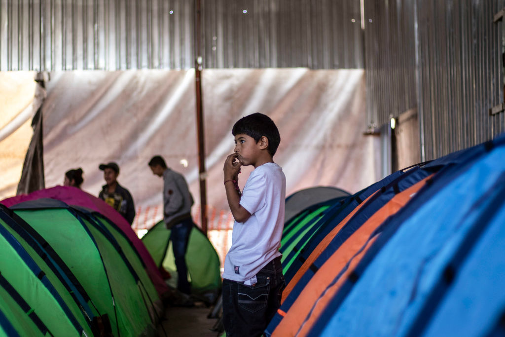 The Trump administration has reached an unofficial agreement with Mexico to keep asylum seekers out of the United States while their applications are being processed, The Washington Post reported Friday. (Photo credit: GUILLERMO ARIAS/AFP/Getty Images)