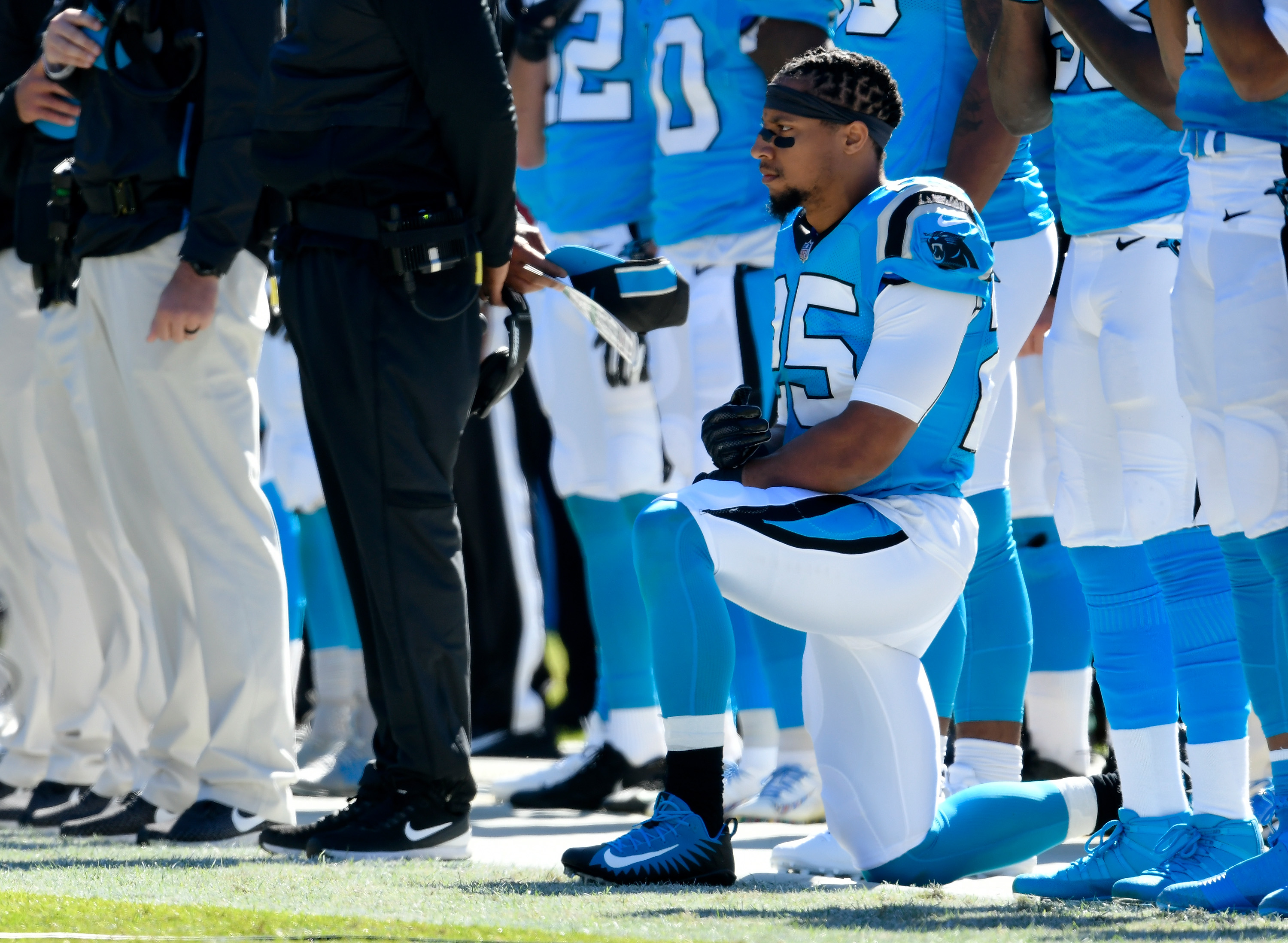 CHARLOTTE, NC - OCTOBER 28: Eric Reid #25 of the Carolina Panthers kneels during the anthem against the Baltimore Ravens at Bank of America Stadium on October 28, 2018 in Charlotte, North Carolina. (Photo by Grant Halverson/Getty Images)