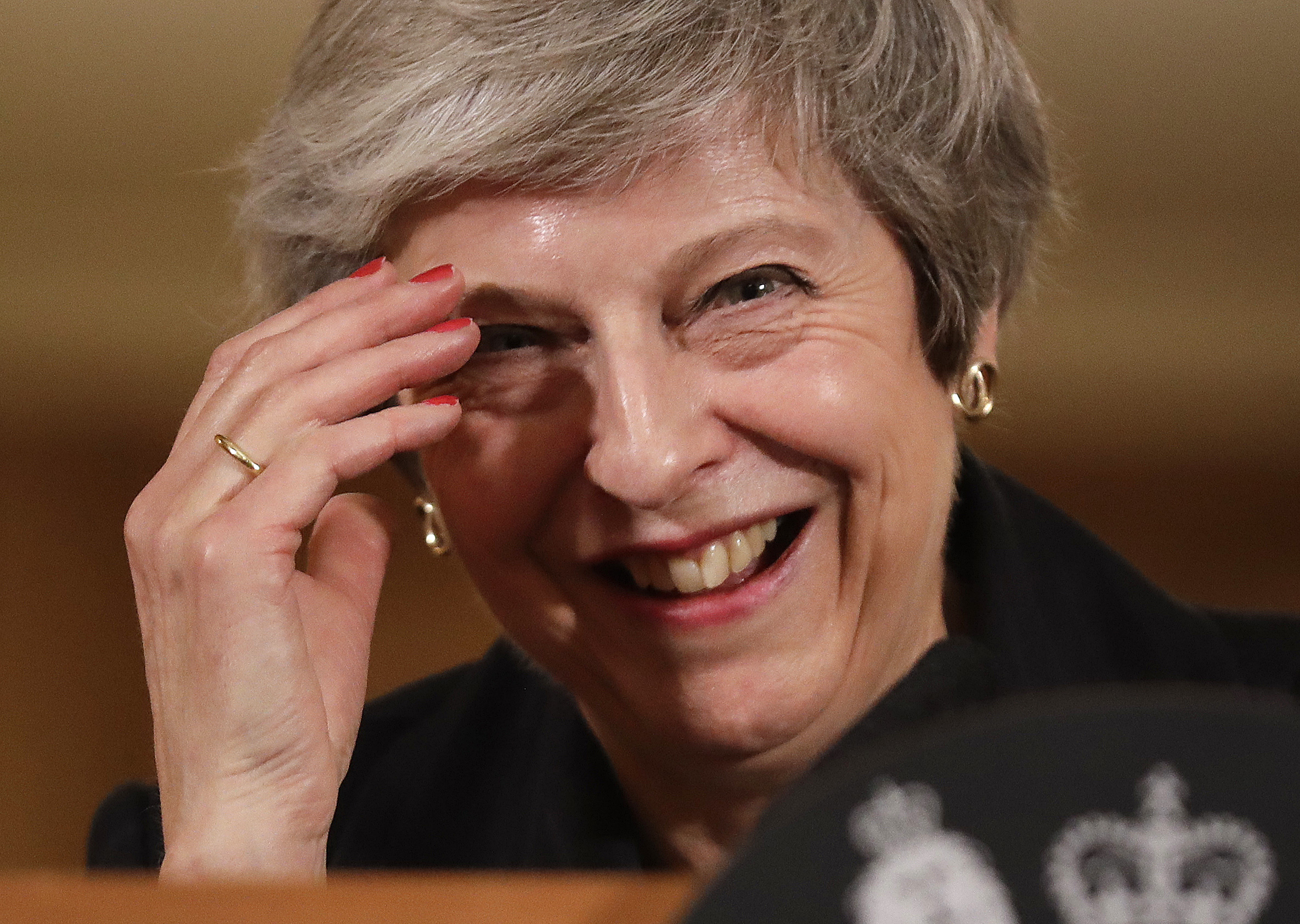 British Prime Minister Theresa May battled against a rebellion over her draft Brexit deal on Thursday, as ministers resigned and members of her own party plotted to oust her. (Photo credit: MATT DUNHAM/AFP/Getty Images)