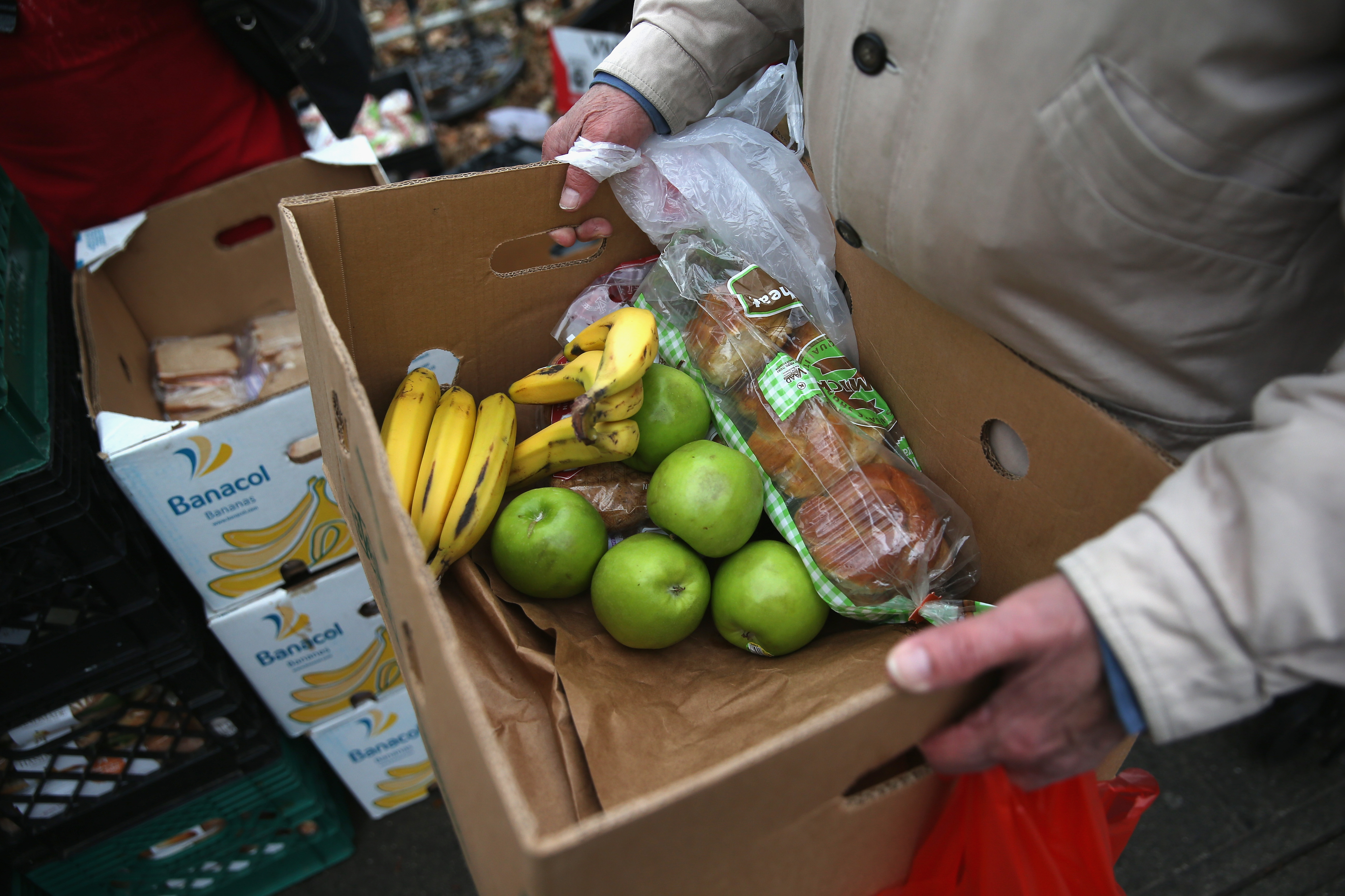 President Trump's anti-immigrant rhetoric is negatively affecting the number of immigrant families enrolled in the Supplemental Nutrition Assistance Program (SNAP), known colloquially as food stamps. (Photo Credit: John Moore/Getty Images)