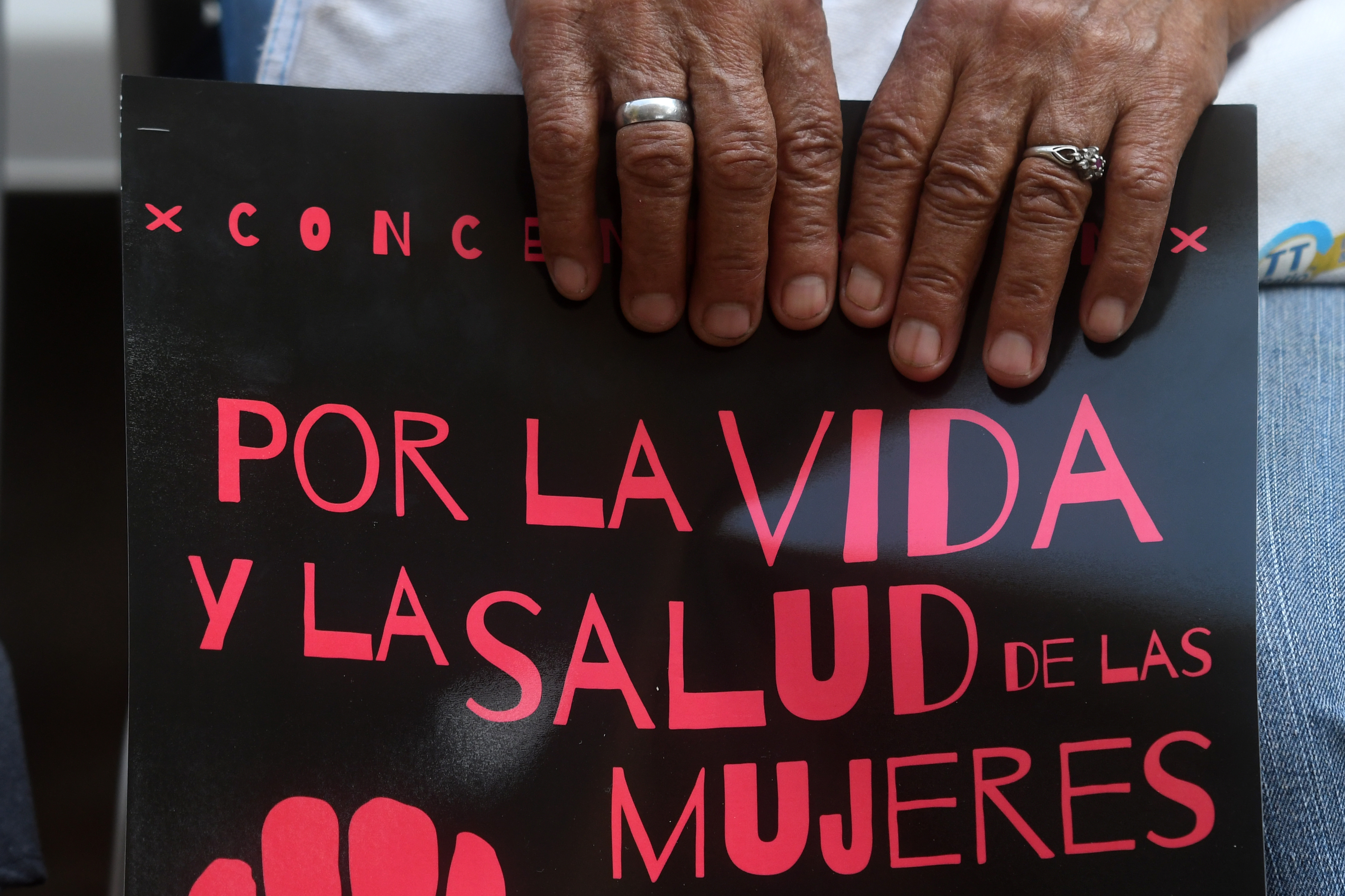 Salvadoran women take part in a demonstration to demand the decriminalization of abortion, outside the Legislative Assembly in San Salvador on February 23, 2017. (Photo CREDIT: MARVIN Recinos/AFP/Getty Images)