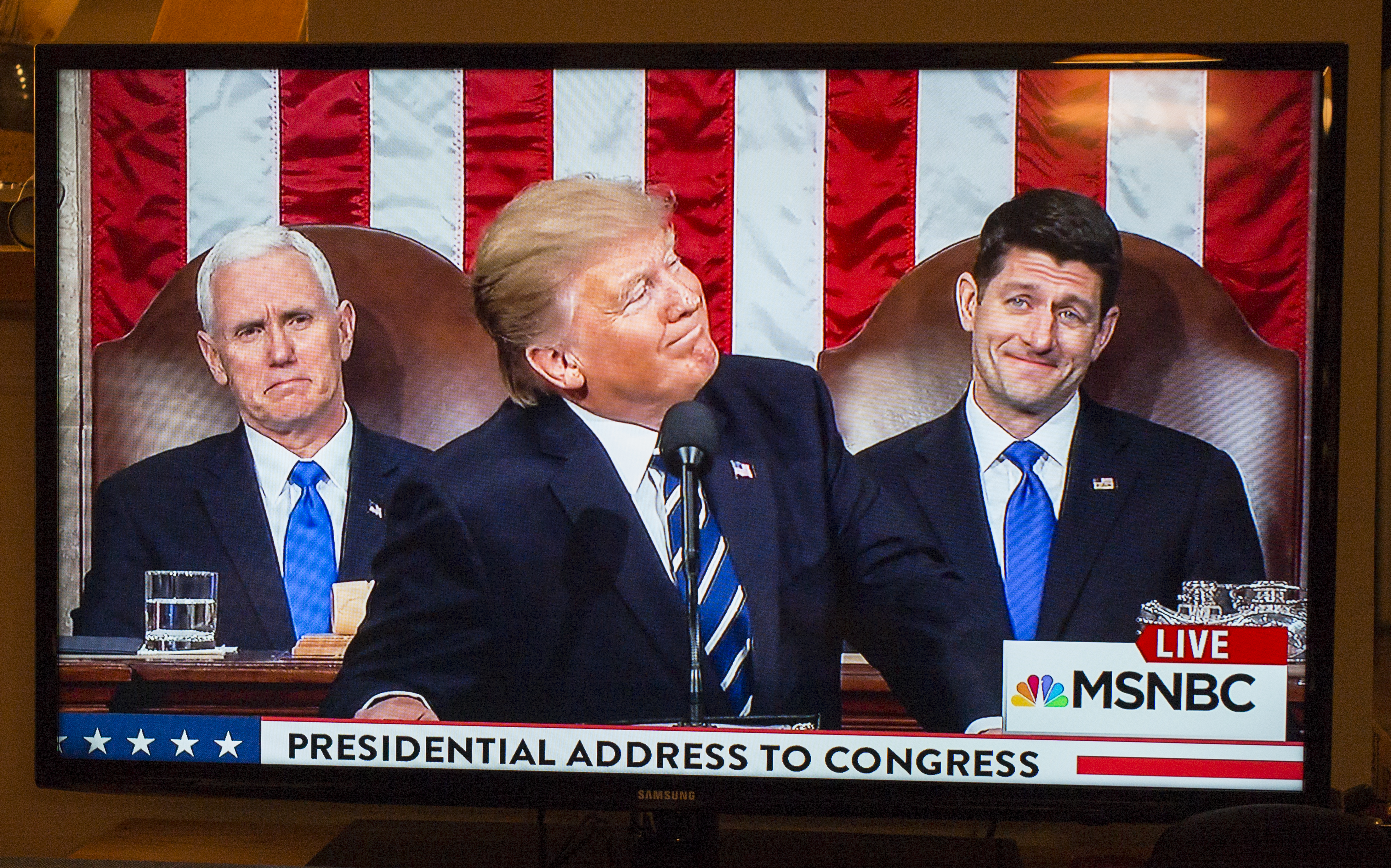 A picture taken from a television screen shows U.S. President Donald Trump addressing a joint session of the the U.S. Congress on February 28, 2017 in the House Chamber of the U.S. Capitol in Washington, DC. (PHOTO CREDIT: Robert Nickelsberg/Getty Images)