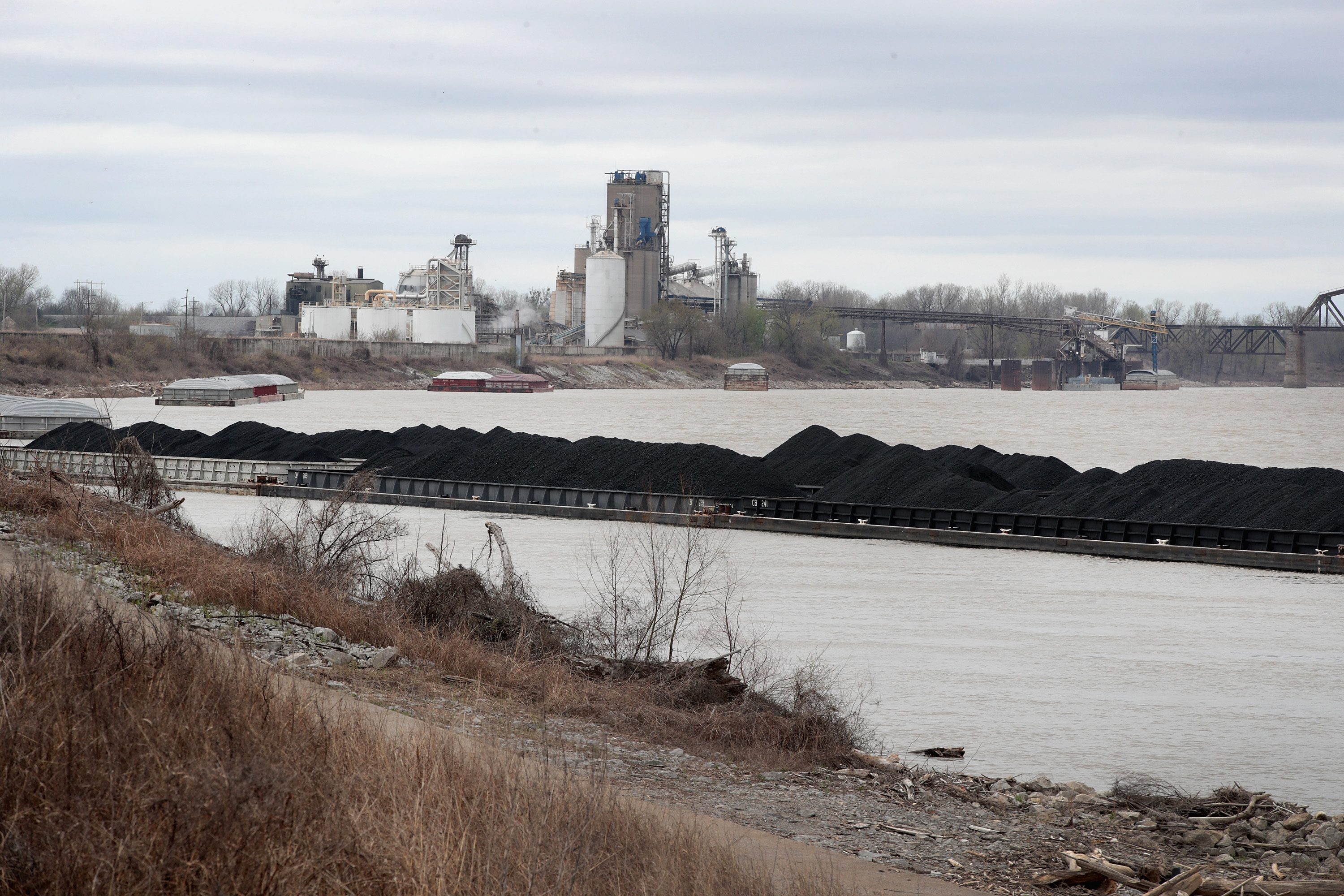 A barge loaded with Illinois Basin coal sits in the Ohio River on April 3, 2017 at Cairo, Illinois. CREDIT: Scott Olson/Getty Images