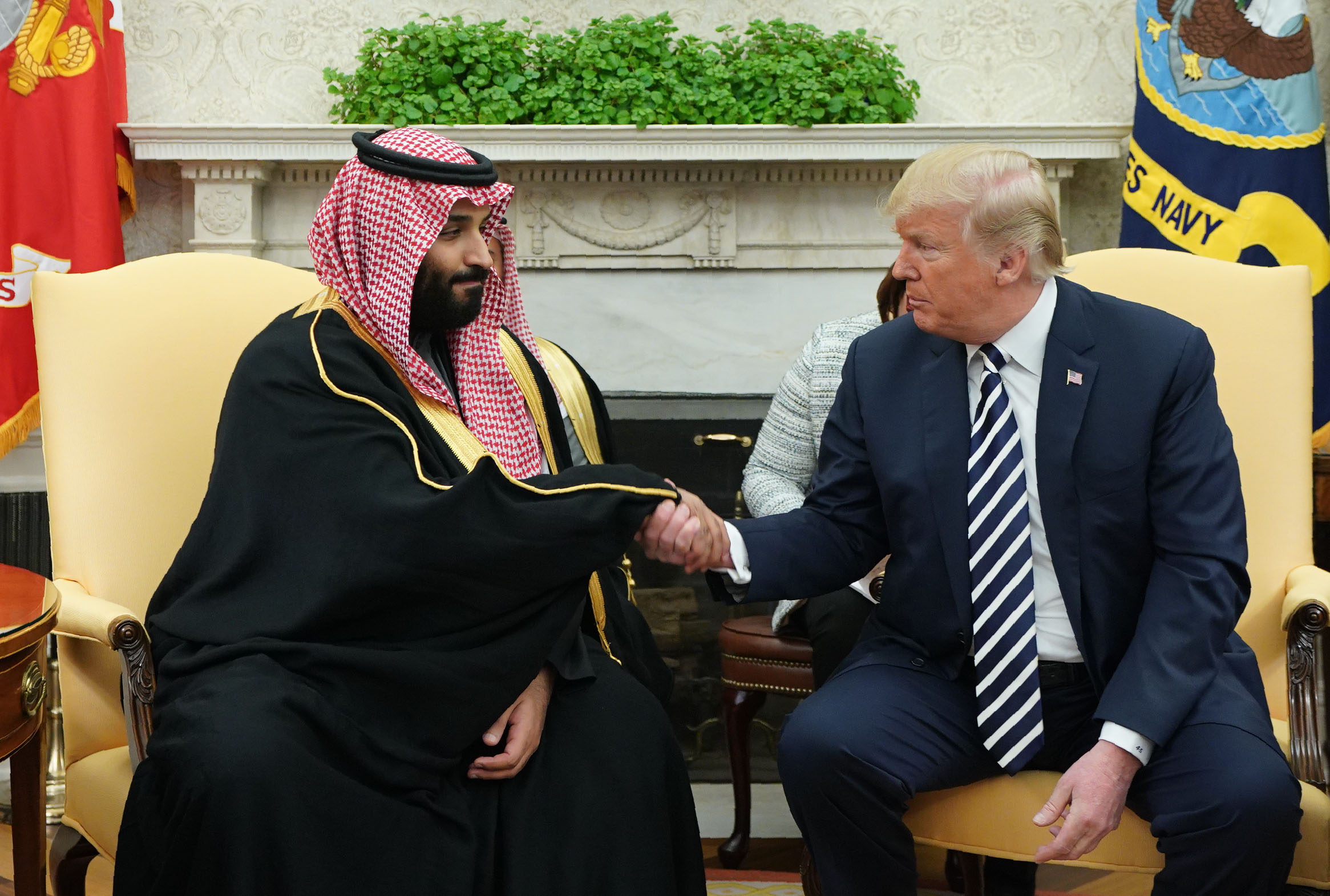 President Donald Trump shakes hands with Saudi Arabia's Crown Prince Mohammed bin Salman in the Oval Office of the White House on March 20, 2018. CREDIT: Mandel Ngan/AFP/Getty Images.