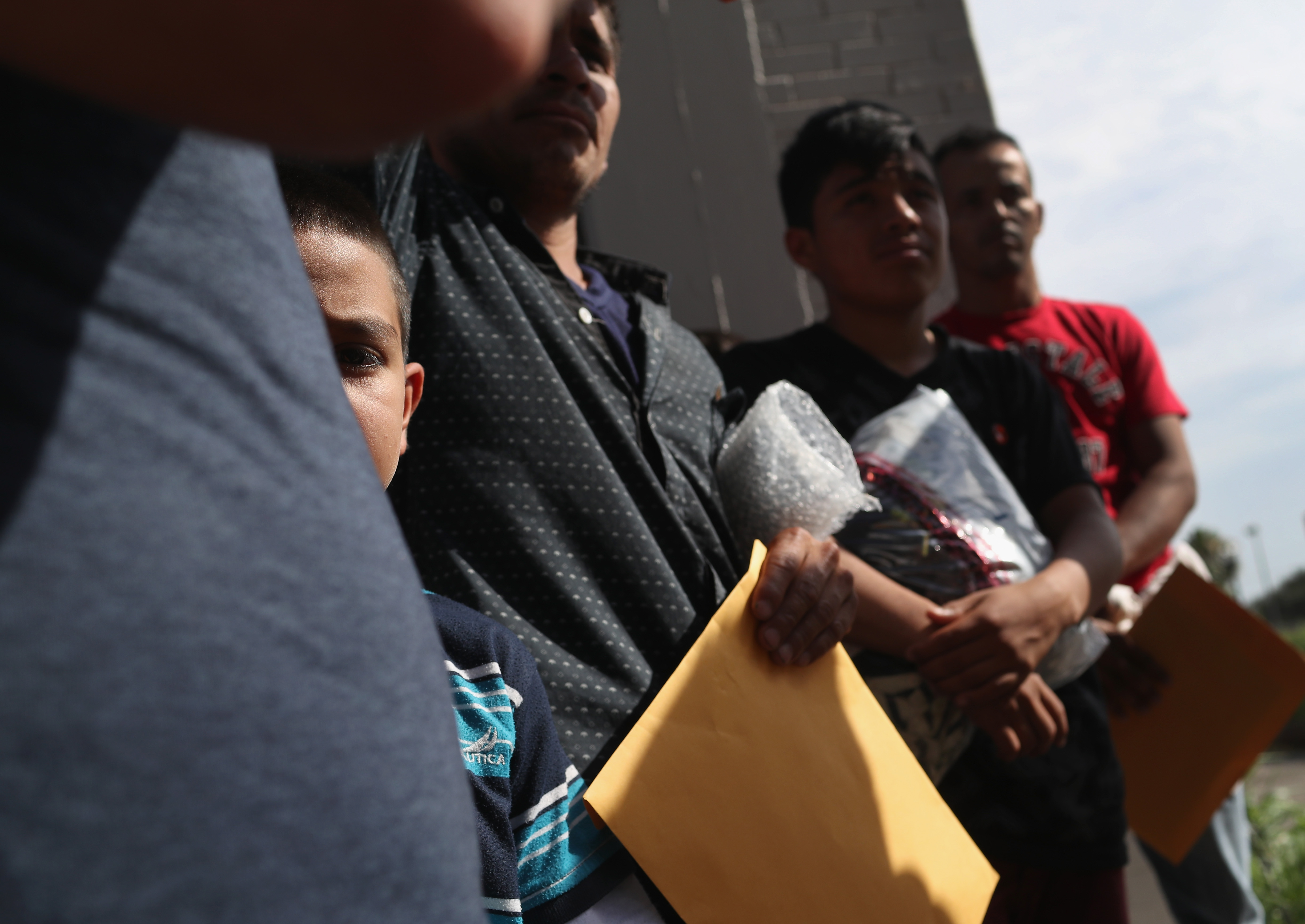 MCALLEN, TX - JUNE 11: Central American immigrant families depart ICE custody, pending future immigration court hearings on June 11, 2018 in McAllen, Texas. Thousands of undocumented immigrants continue to cross into the U.S., despite the Trump administration's recent "zero tolerance" approach to immigration policy. (Photo by John Moore/Getty Images)