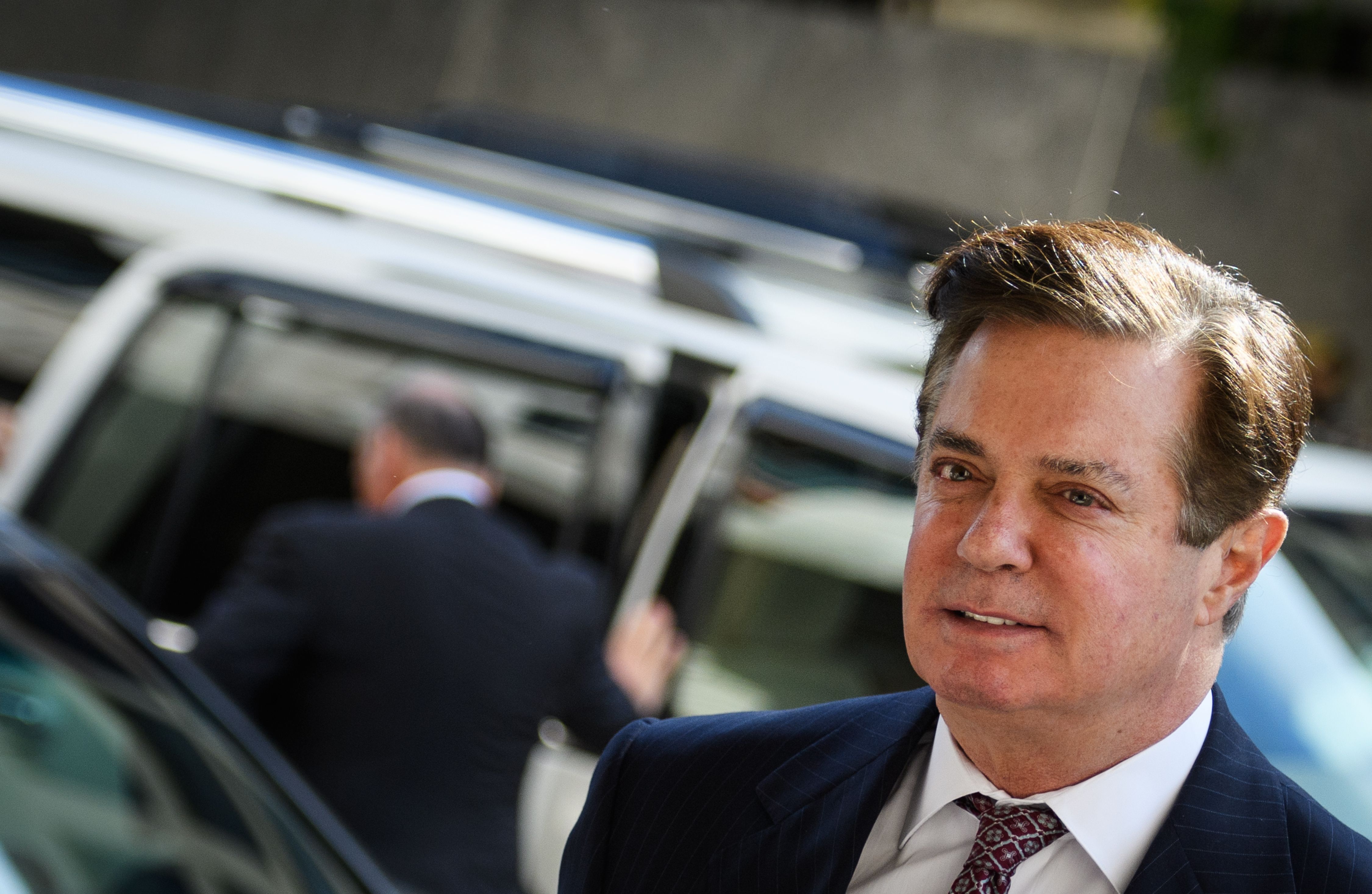 Paul Manafort arrives for a hearing at US District Court on June 15, 2018 in Washington, DC. - A judge revoked Manafort's bail and sent him to jail over claims he was tampering with witnesses in the case against him brought by special counsel Robert Mueller. (Photo by MANDEL NGAN / AFP) (Photo credit should read MANDEL NGAN/AFP/Getty Images)