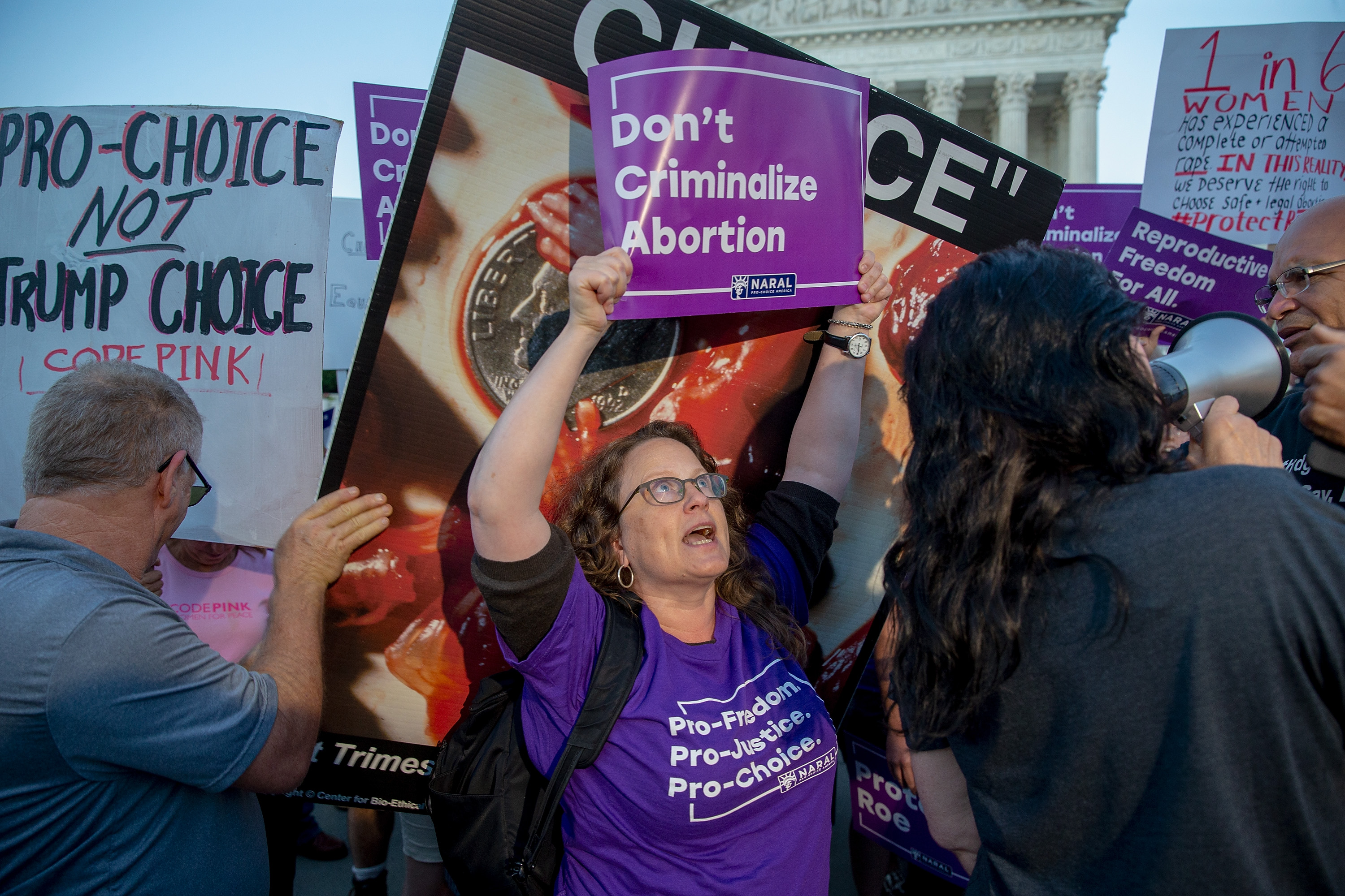 Pro-choice and anti-abortion protesters demonstrate in front of the U.S. Supreme Court on July 9, 2018 in Washington, DC. (Credit: Tasos Katopodis/Getty Images)