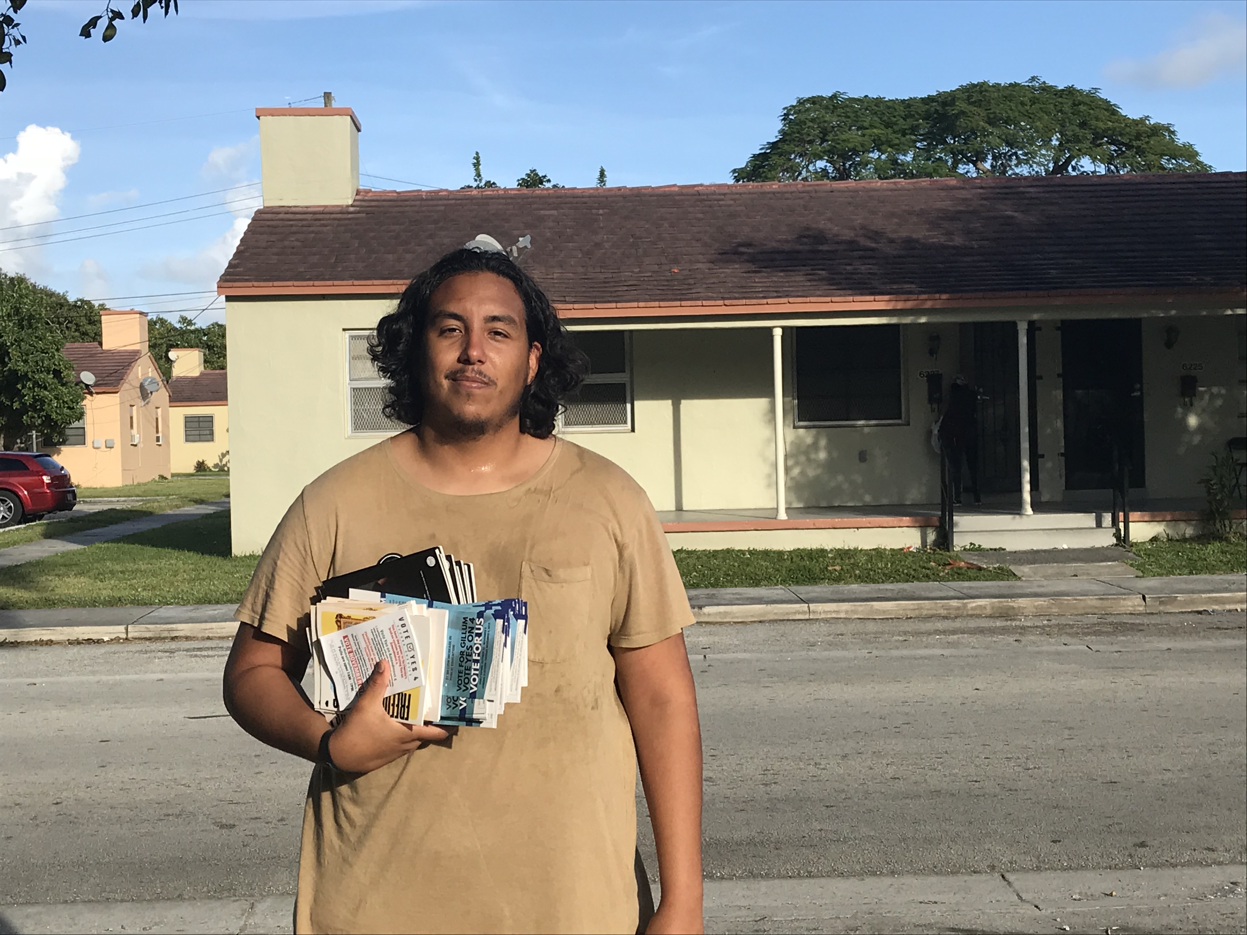 Dream Defender Jonathan Flores out campaigning in Liberty City (Photo Credit: Luke Barnes for ThinkProgress)