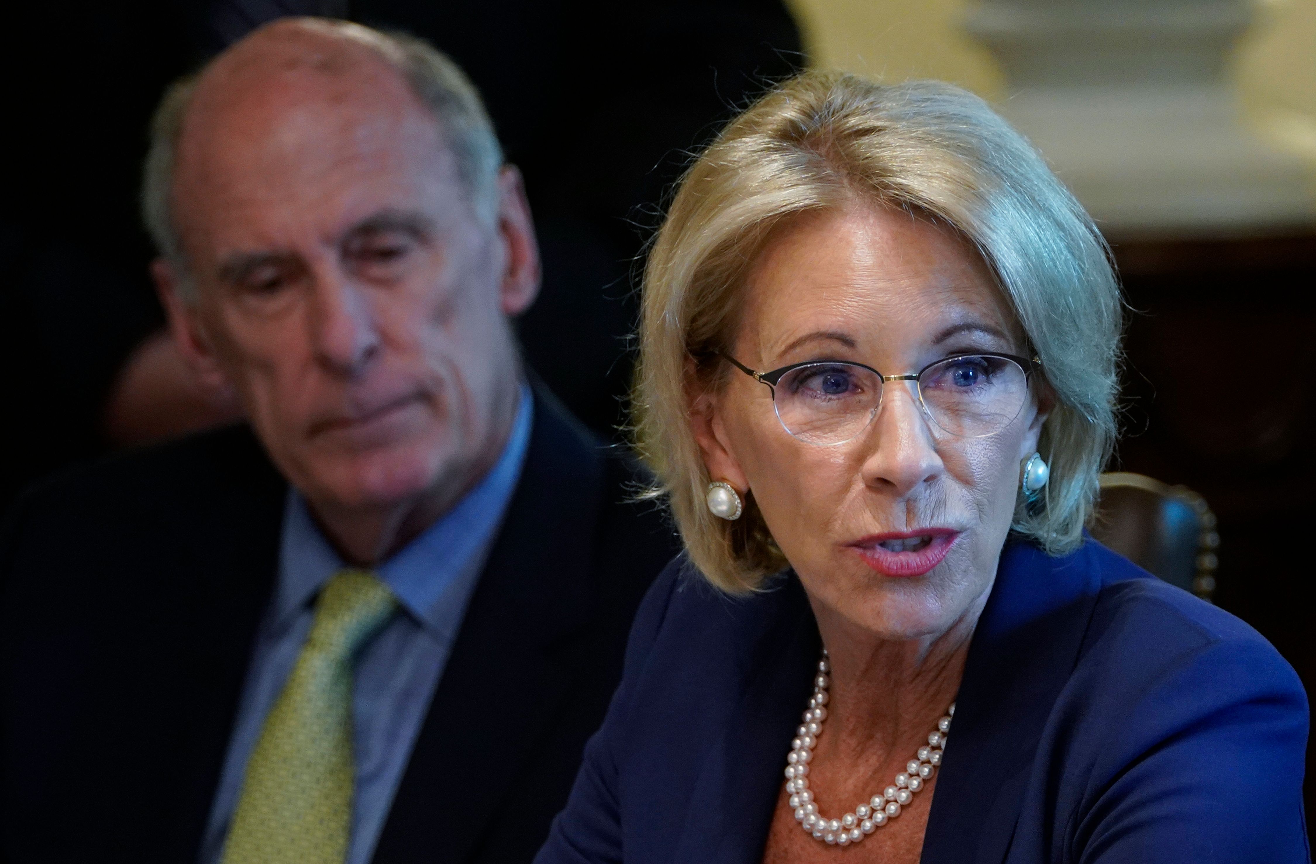 US Education Secretary Betsy DeVos speaks during a Cabinet meeting in the Cabinet Room of the White House on August 16, 2018 in Washington, DC. (Photo by MANDEL NGAN / AFP) (Photo credit should read MANDEL NGAN/AFP/Getty Images)