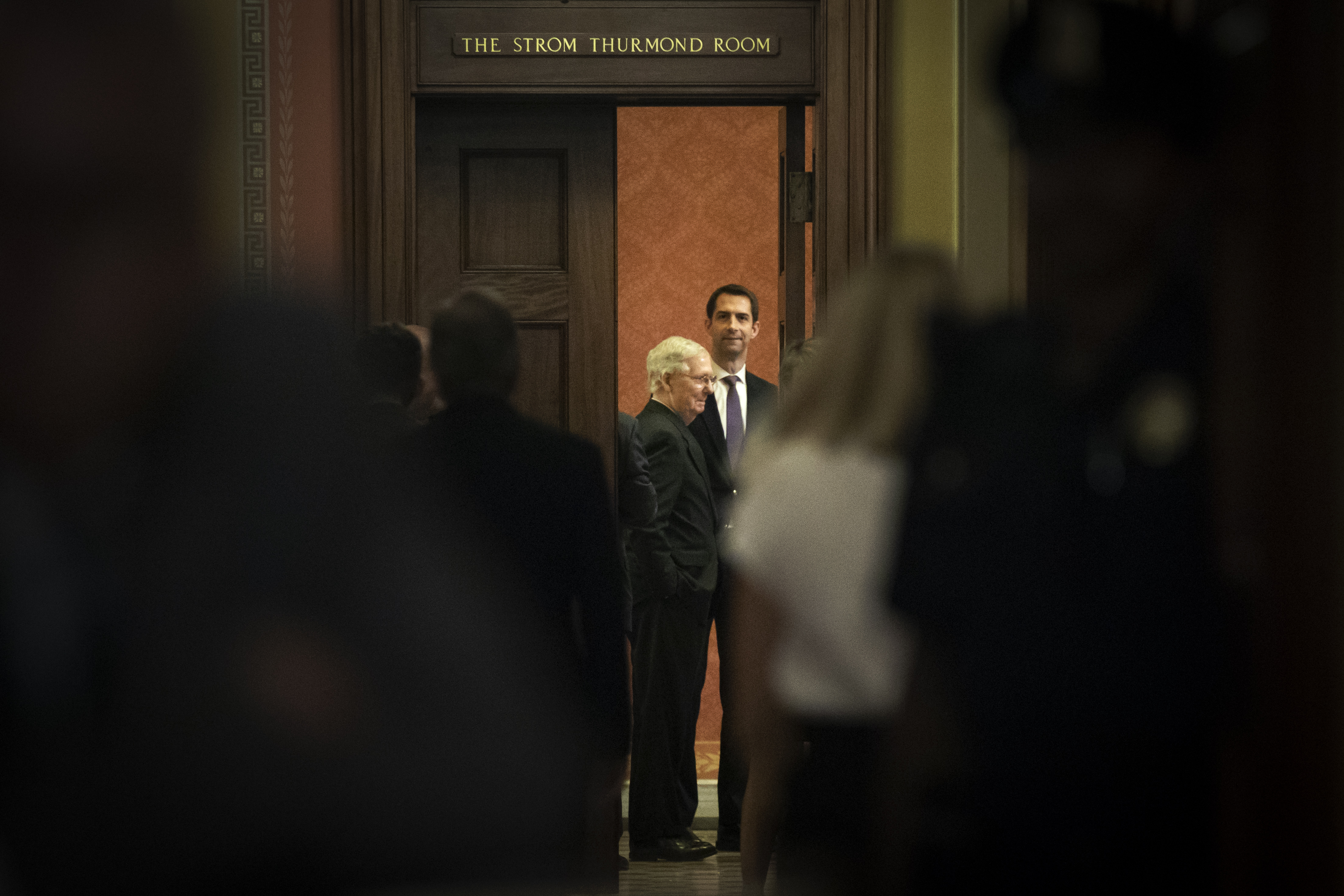 Sen. Tom Cotton, right, saw his last-ditch efforts to shatter a bipartisan coalition in support of modest prison reforms defeated on Tuesday night. CREDIT: Drew Angerer/Getty Images