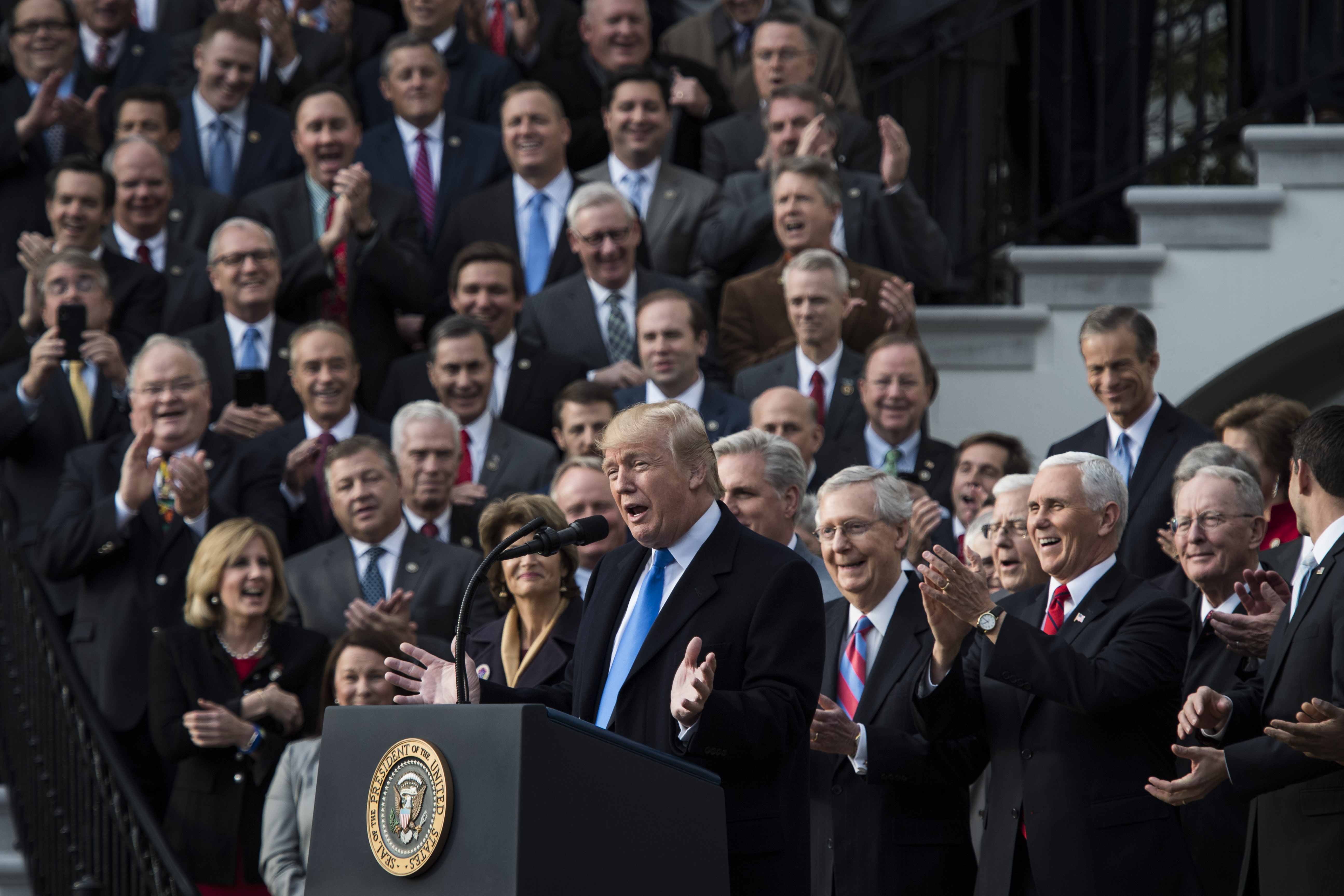WASHINGTON, DC - DECEMBER 20: President Donald Trump with Congressional Republicans on the South Lawn at the White House shortly after the passage of the tax bill. Credit: Jabin Botsford/The Washington Post via Getty Images