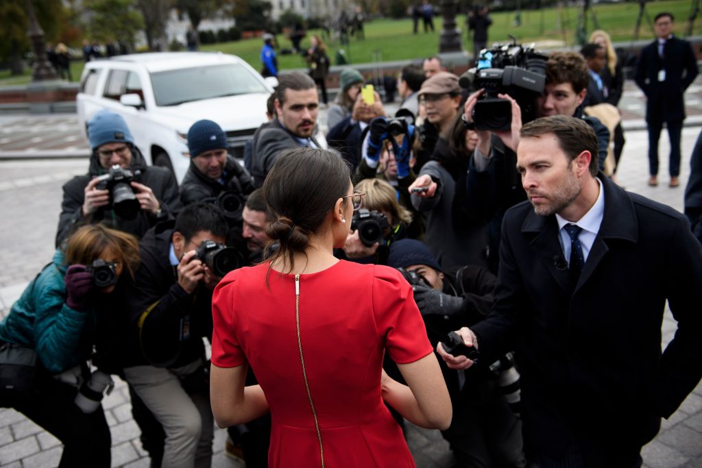 Incoming Rep. Alexandria Ocasio-Cortez (D-NY) speaks to reporters after a group photo with freshman members of the 116th Congress on Capitol Hill November 14, 2018 in Washington, DC. (Credit: Brendan Smialowski / AFP)