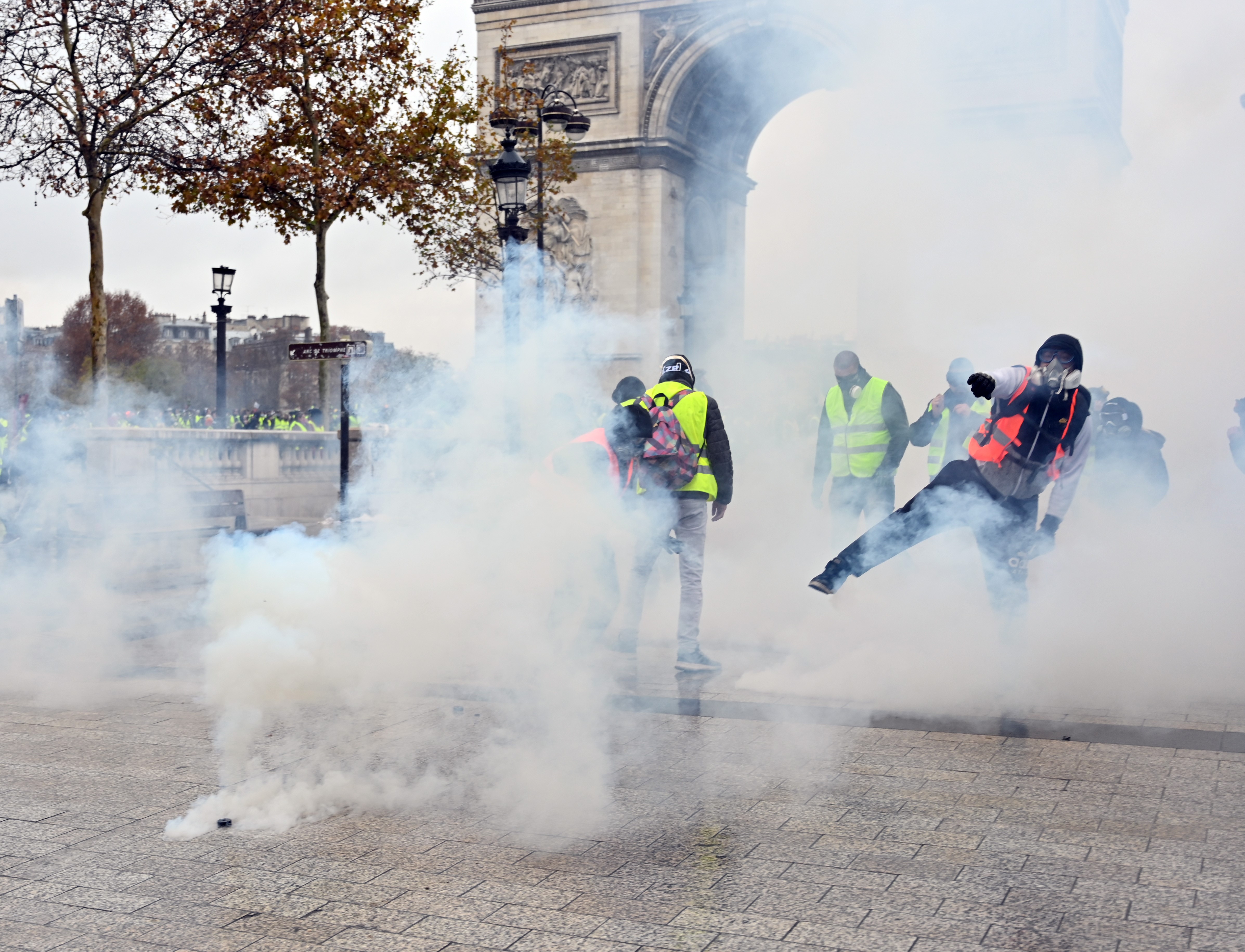 PARIS, FRANCE - DECEMBER 01: Security forces in Paris fired tear gas and water cannon to protesters around Arc de Triomphe in Paris, France on December 01, 2018. (Photo by Mustafa Yalcin/Anadolu Agency/Getty Images)