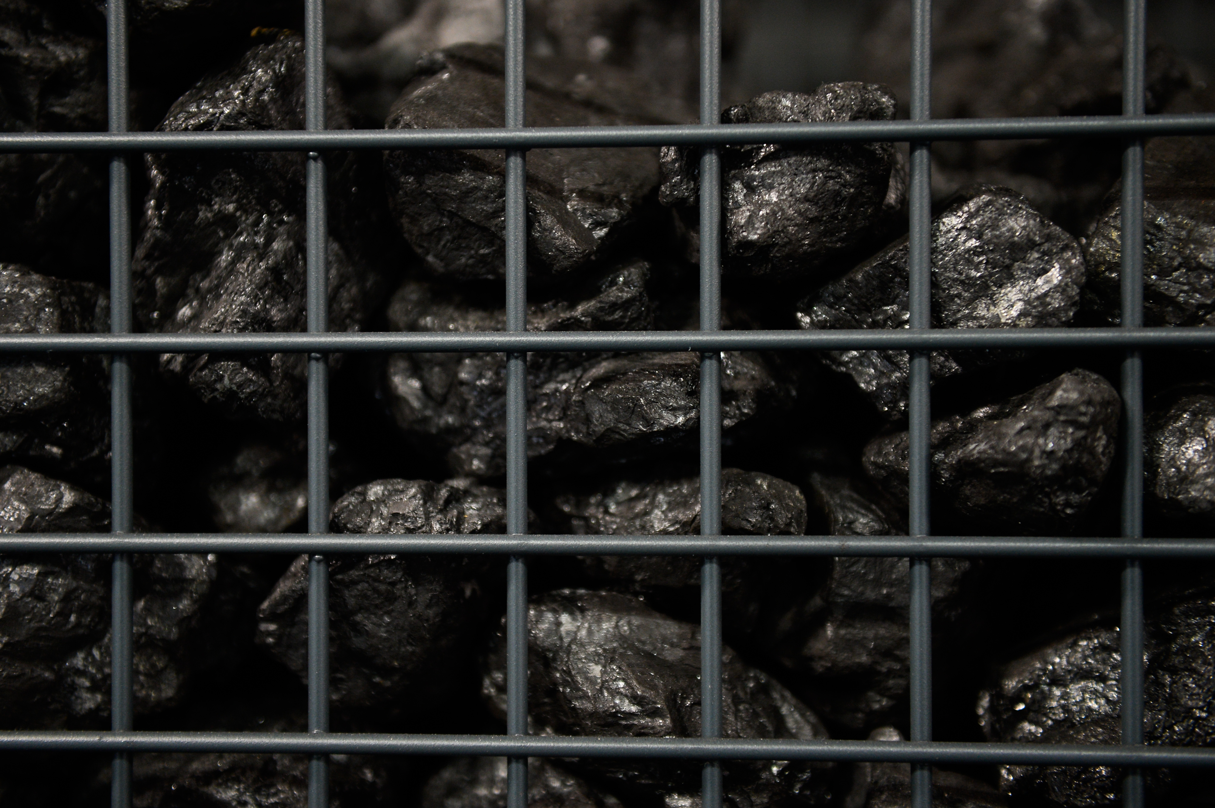 Pieces of coal are seen being used as part of the decoration on the Poland's stand during the COP24 UN Climate Change Conference 2018. CREDIT: Omar Marques/SOPA Images/LightRocket via Getty Images