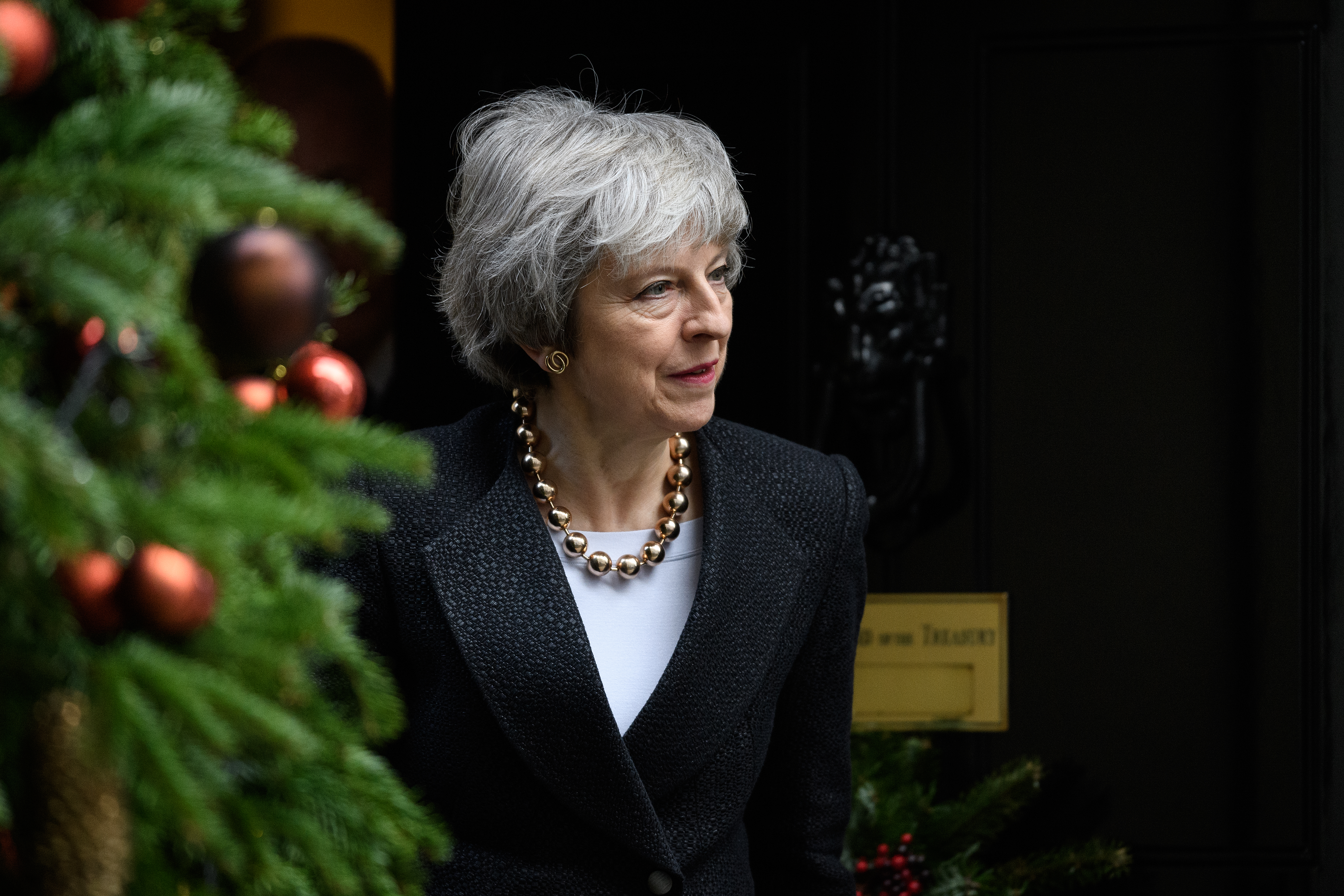 LONDON, ENGLAND - DECEMBER 20: British Prime Minister Theresa May walks from number 10, Downing Street as she prepares to greet her Polish counterpart Mateusz Morawiecki ahead of a meeting on December 20, 2018 in London, England. Prime Minister Morawiecki is in the UK to discuss defence and security issues, as well as Brexit concerns regarding migrants.
(Photo by Leon Neal/Getty Images)