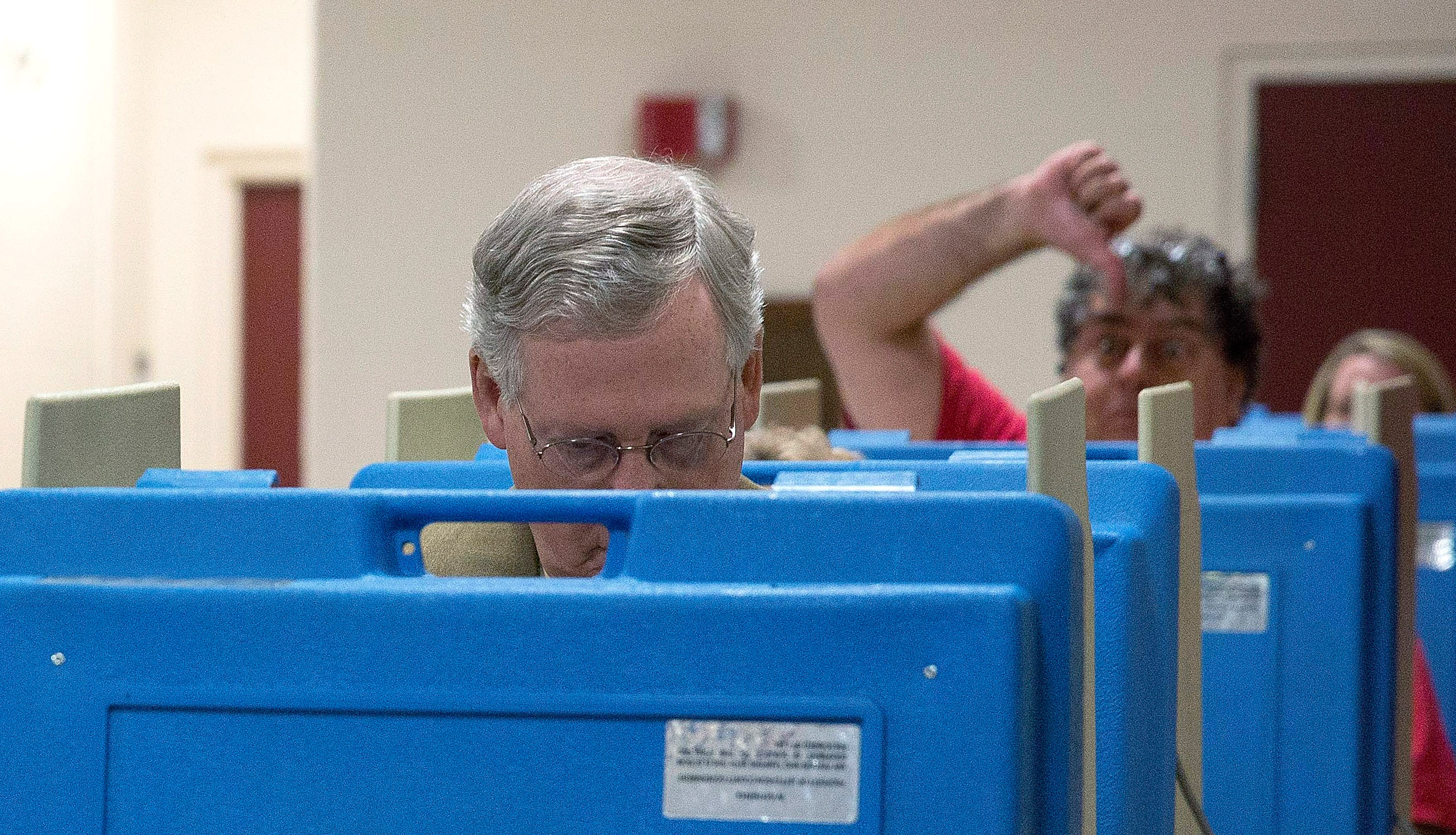 Republicans like Sen. Mitch McConnell have been obsessed with non-existent voter fraud for years. Suddenly they've gone silent when faced with actual election fraud. Why? Credit: Aaron P. Bernstein/Getty Images