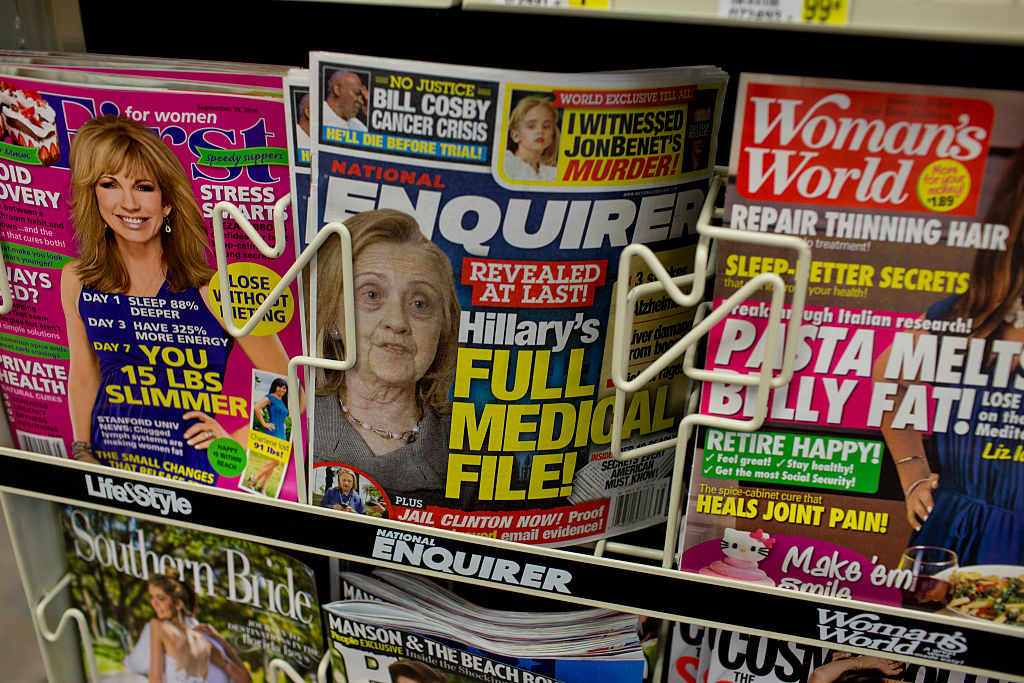 News this week has revealed how The National Enquirer and its parent company American Media Inc. functioned as the propaganda arm of the Trump campaign during the 2016 election. (Photo credit: Andrew Lichtenstein/ Corbis via Getty Images)