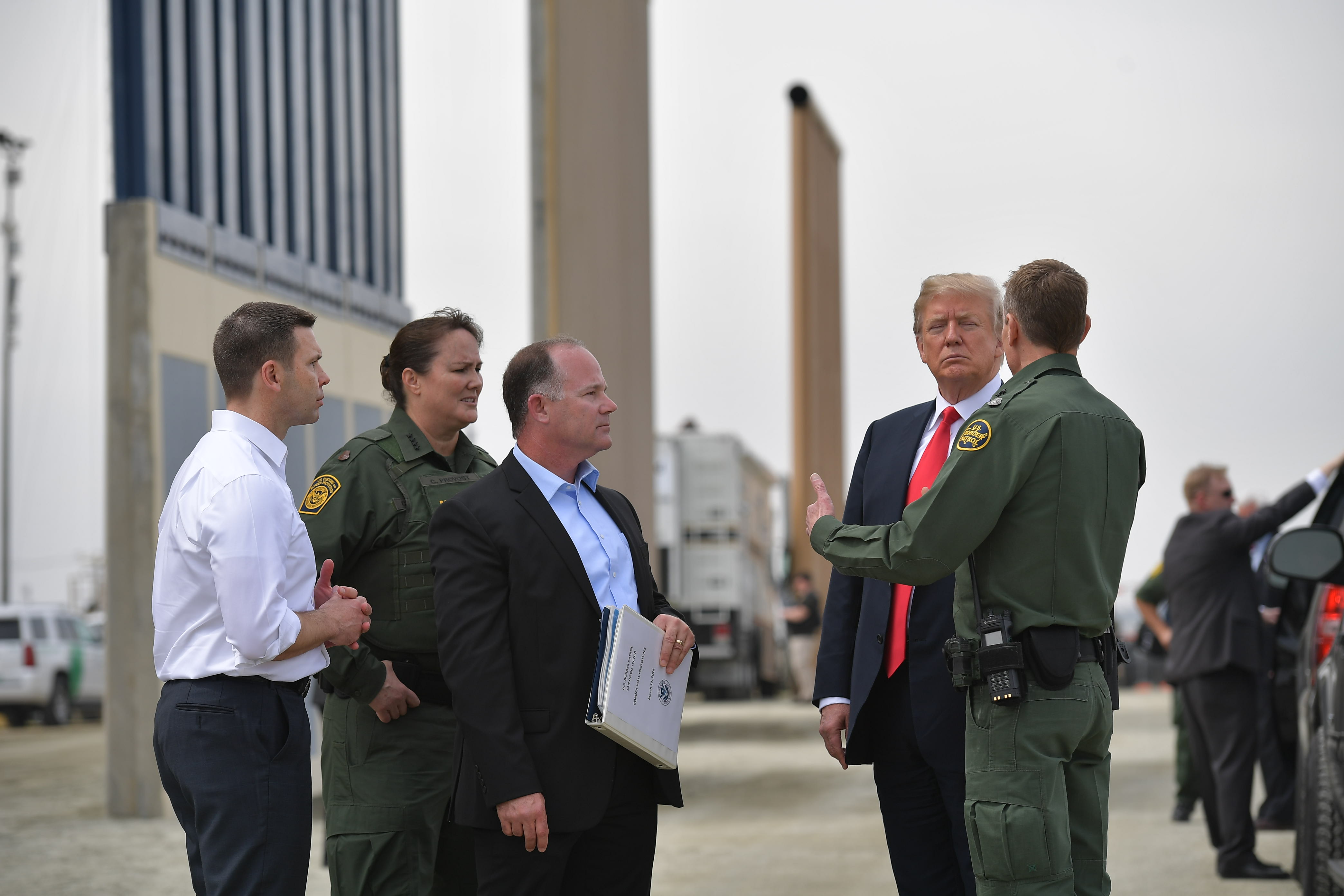 Trump inspecting border wall prototypes in San Diego, California on March 13, 2018. (CREDIT: MANDEL NGAN/AFP/Getty Images)