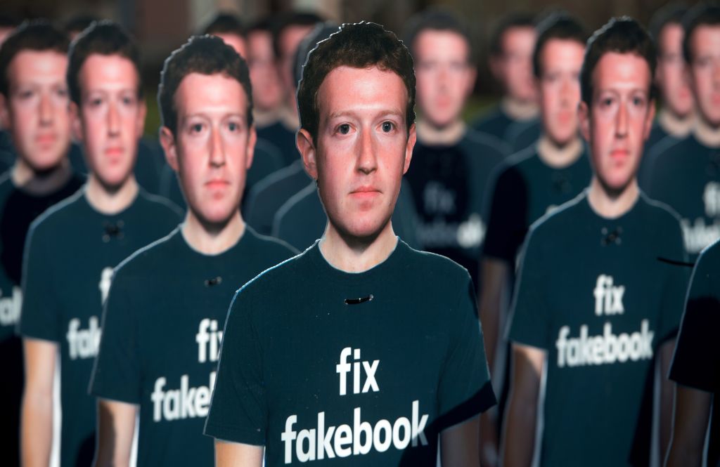 Cardboard cutouts of Facebook CEO Mark Zuckerberg stand outside the US Capitol in Washington, DC, April 10, 2018. CREDIT: SAUL LOEB/AFP/Getty Images.