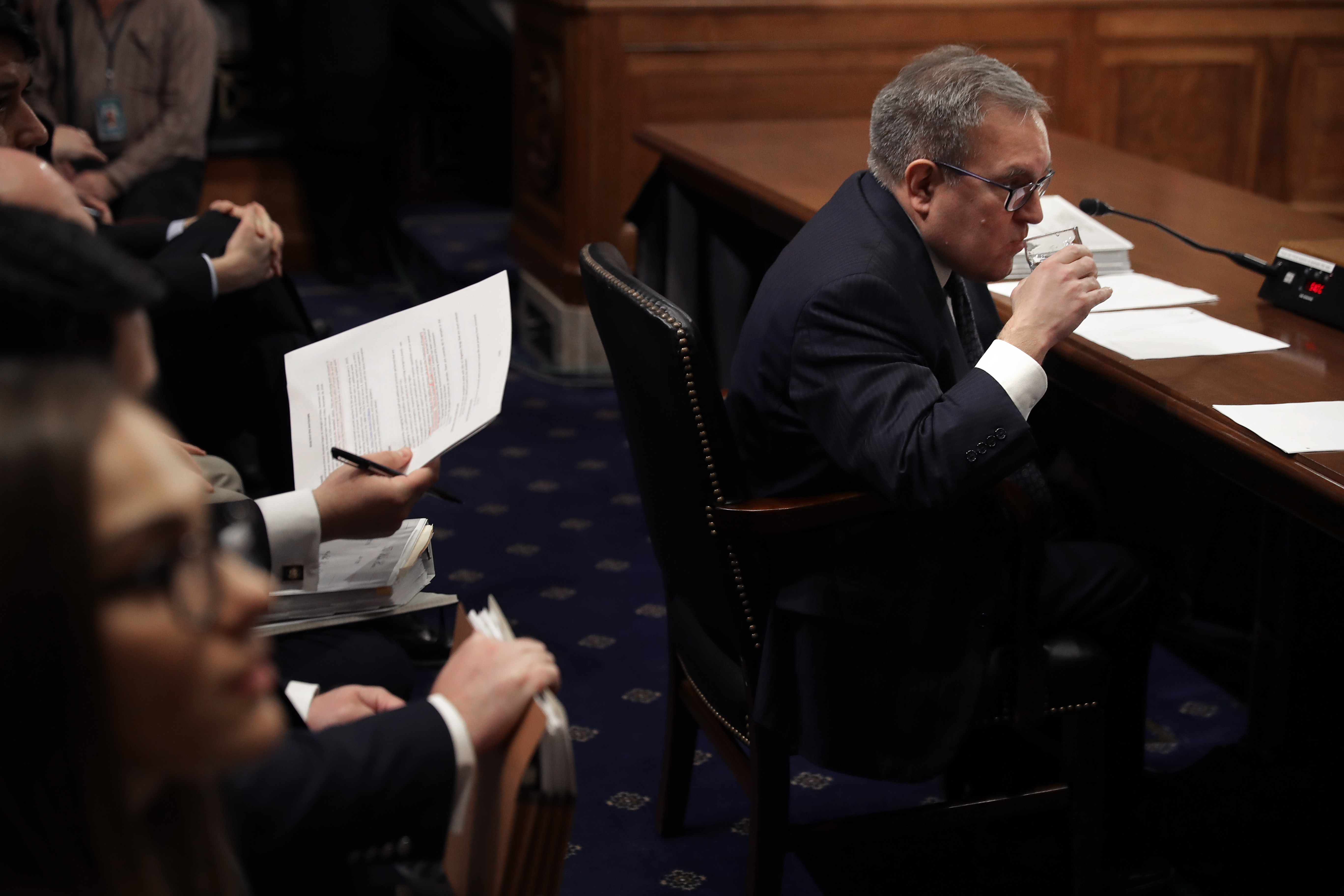 Acting EPA Administrator Andrew Wheeler takes a sip of water before the start of his confirmation hearing to be the next administrator of the EPA on January 16, 2019. CREDIT: Somodevilla/Getty Images