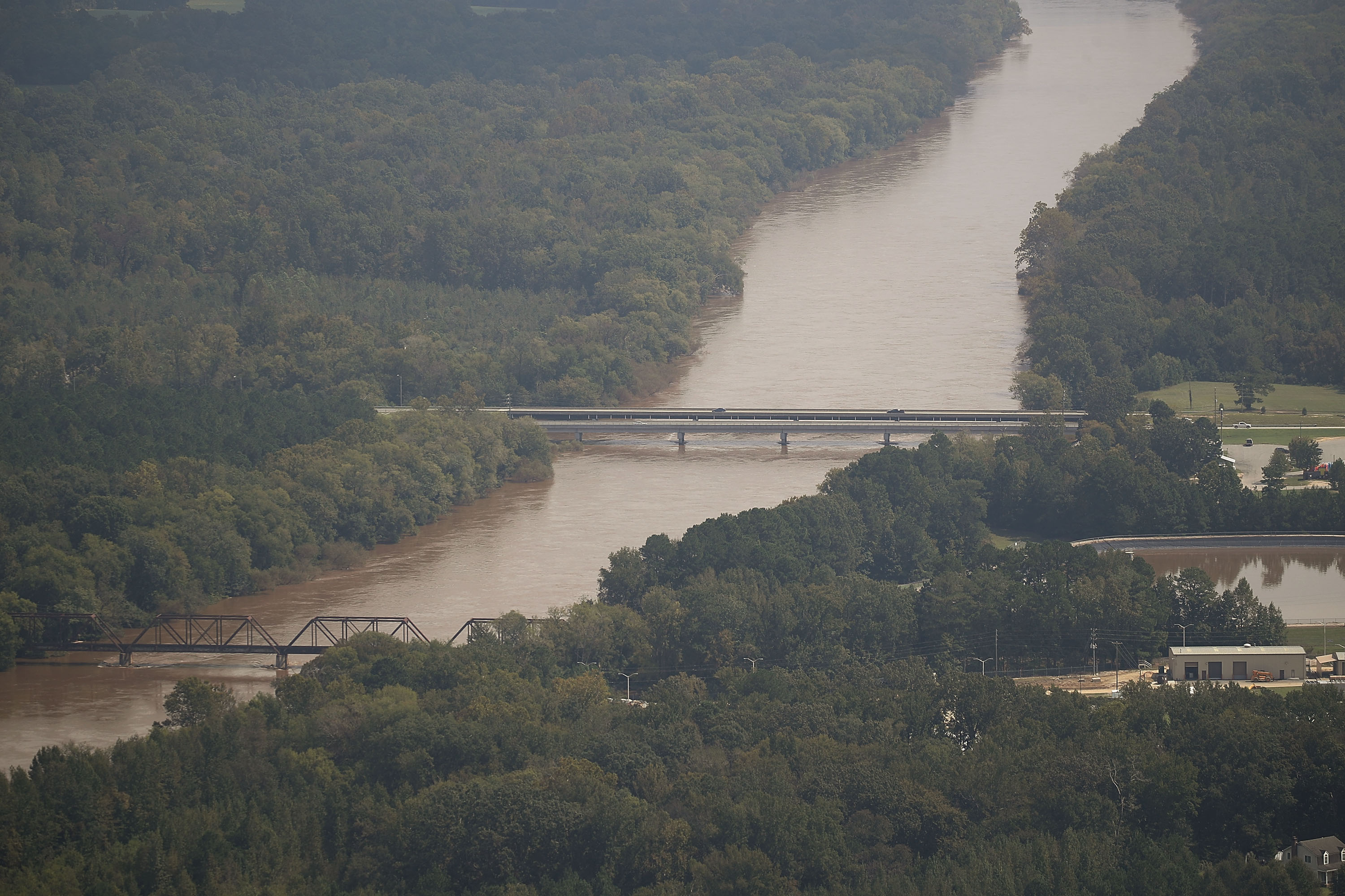 The Cape Fear river is seen running under the North Main Street bridges on September 20, 2018 in Lillington, North Carolina. CREDIT: Joe Raedle/Getty Images