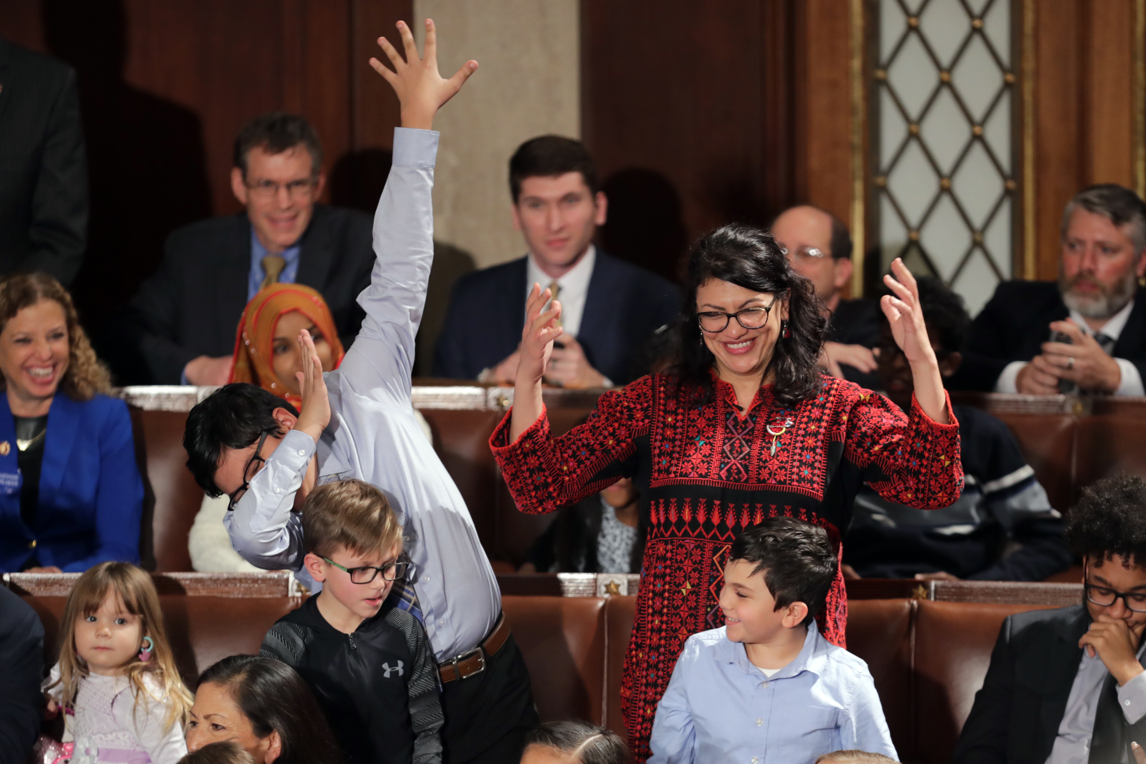 WASHINGTON, DC - JANUARY 3: Rep.-elect Rashida Tlaib (D-MI) votes for Speaker-designate Rep. Nancy Pelosi (D-CA) along with her kids during the first session of the 116th Congress at the U.S. Capitol January 03, 2019 in Washington, DC. (Credit: Chip Somodevilla/Getty Images)