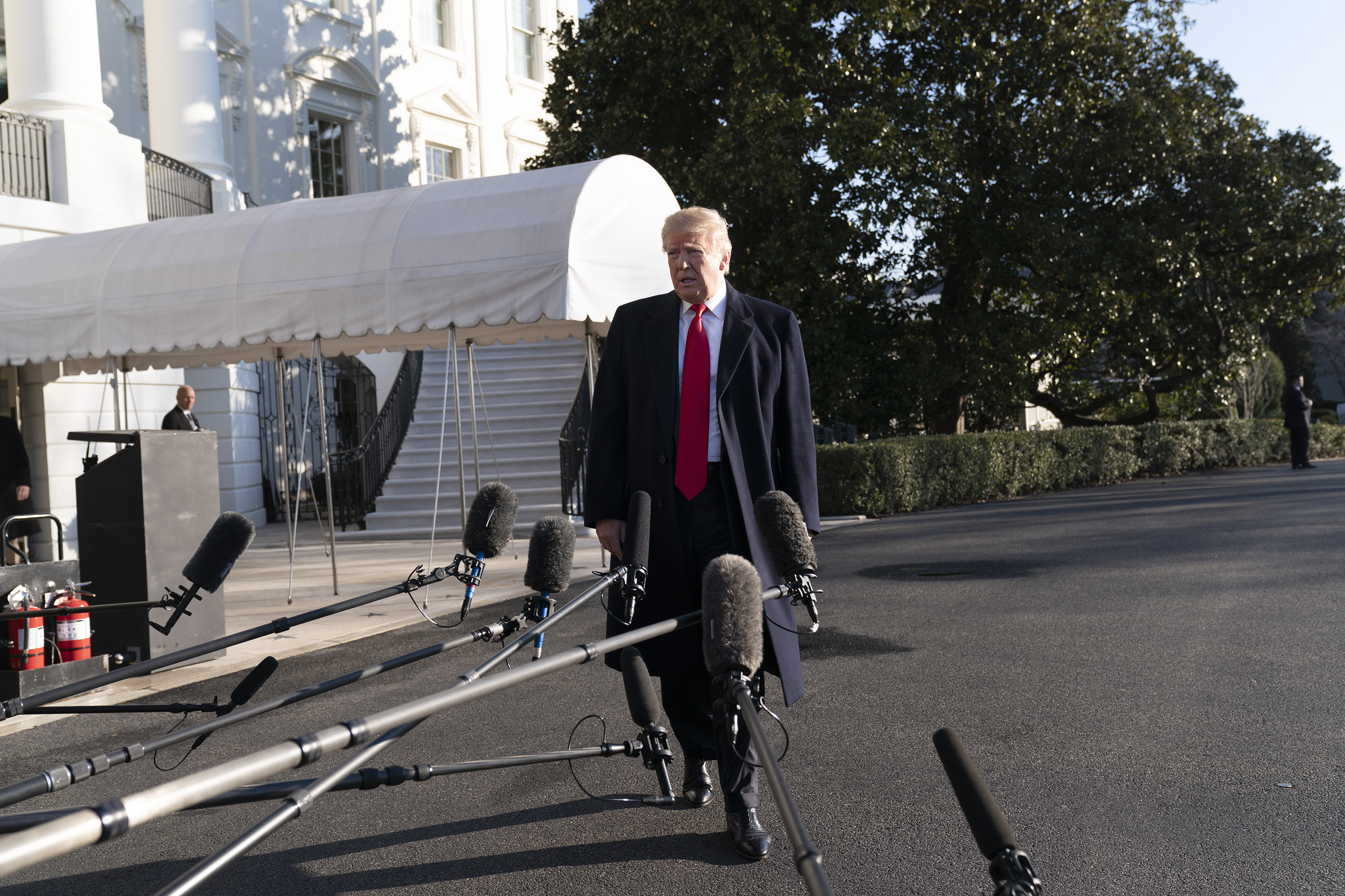 President Trump said Sunday he can "relate" to federal workers going without pay. CREDIT: Photo by Chris Kleponis - Pool/Getty Images