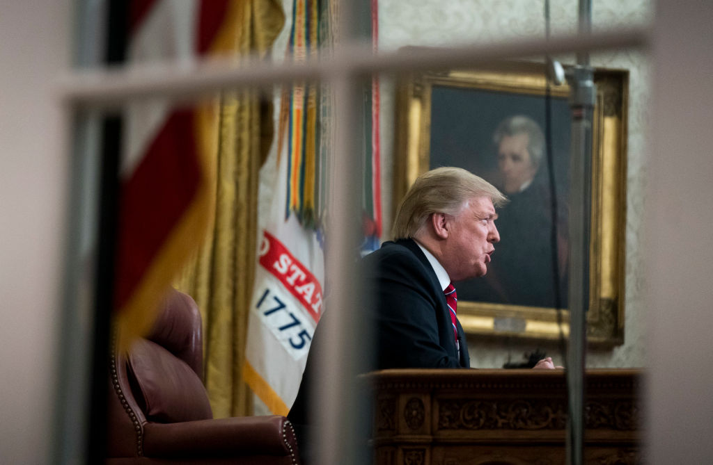 President Donald Trump addressed the nation in his first-prime address from the Oval Office this week, repeating a number of lies about immigration to buoy his demands for a wall along the U.S.-Mexico border, which Democrats have refused to fund. (Photo credit: Kevin Dietsch-Pool/Getty Images)