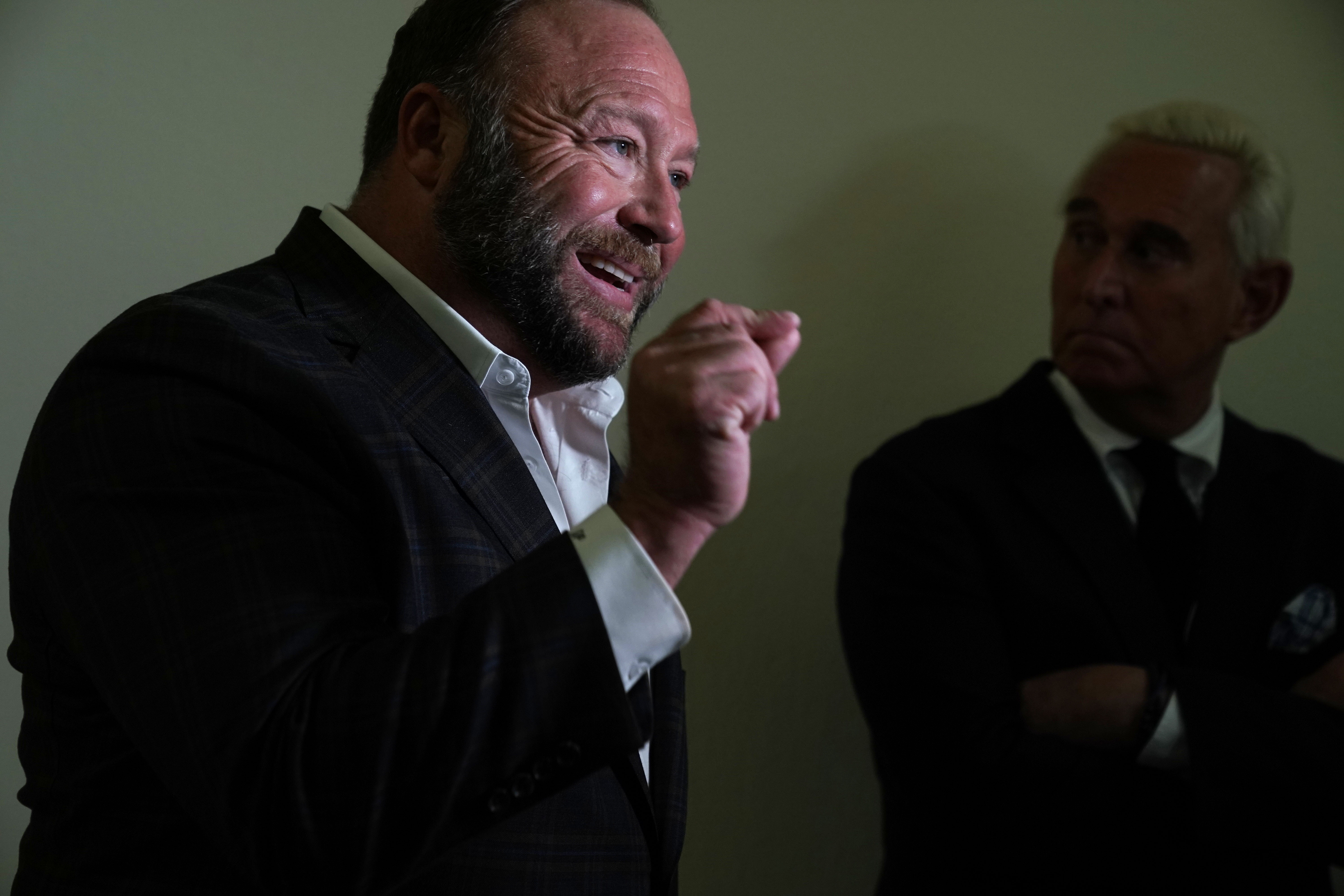 Alex Jones was banned from Roku, but he's finding other work-arounds on Facebook and YouTube. (CREDIT: Alex Wong/Getty Images)