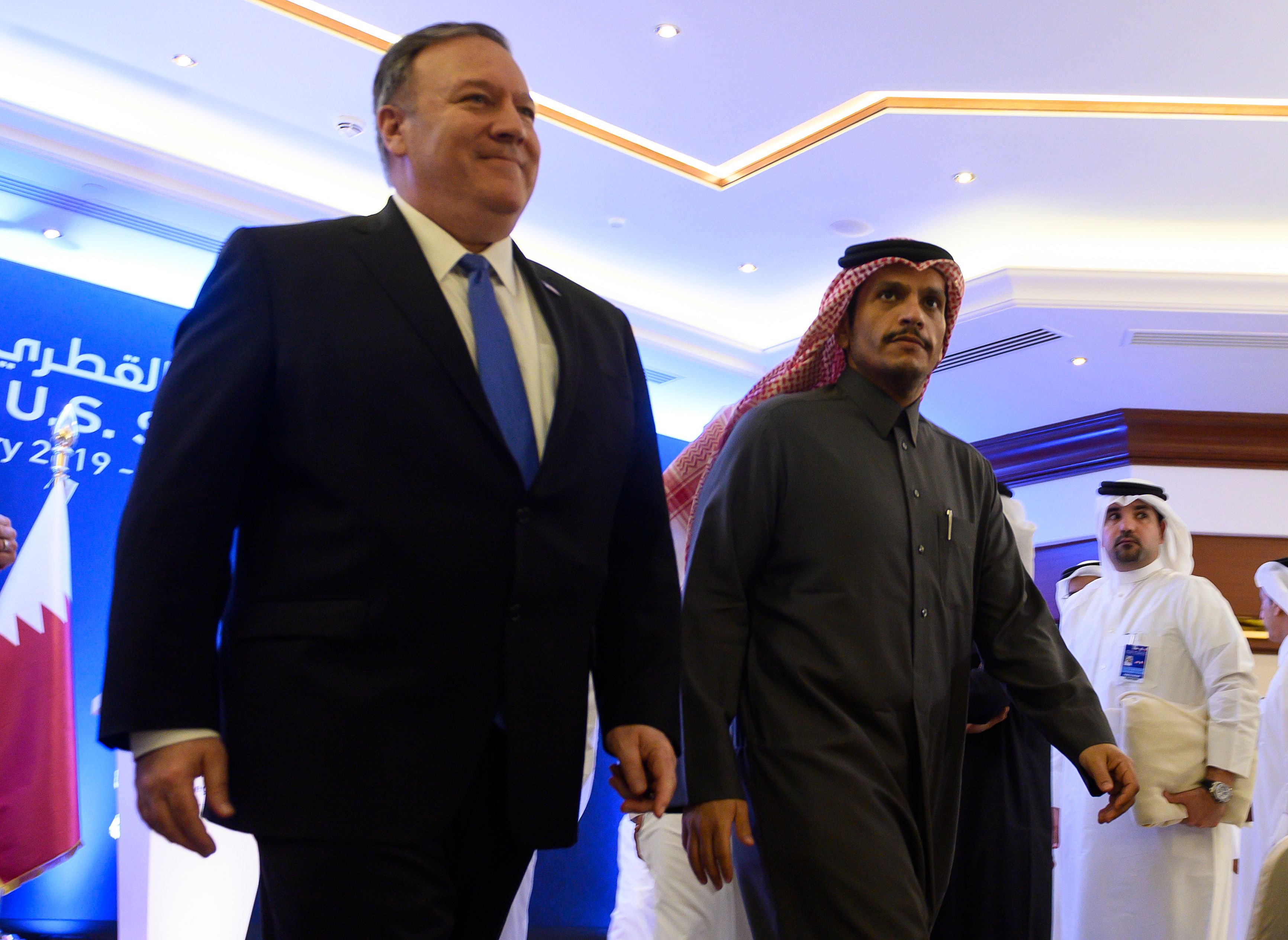 Secretary of State Mike Pompeo and Qatari Deputy Prime Minister and Minister of Foreign Affairs Sheikh Mohammed bin Abdulrahman Al-Thani, arrive at the Sheraton Grand in the Qatari capital Doha to hold a joint press conference, on January 13, 2019. (PHOTO CREDIT: Andrew Caballero-Reynolds/AFP/Getty Images)