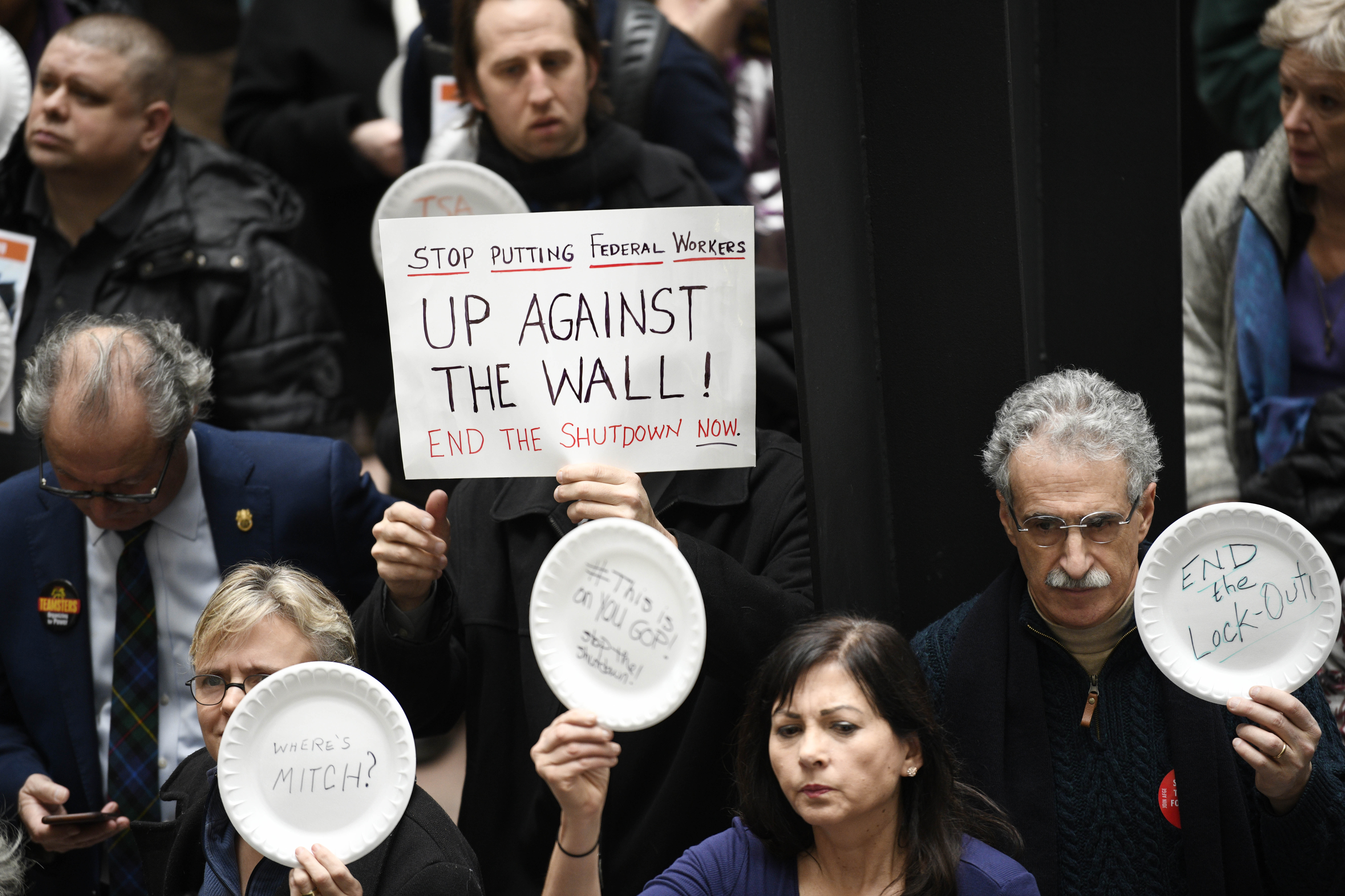 WASHINGTON, Jan. 24, 2019 -- Union members, federal workers and other demonstrators protest the partial government shutdown on day 33 of the shutdown in the Hart Senate Office Building in Washington D.C., the United States, on Jan. 23, 2019. (Xinhua/Liu Jie) (Xinhua/Liu Jie via Getty Images)