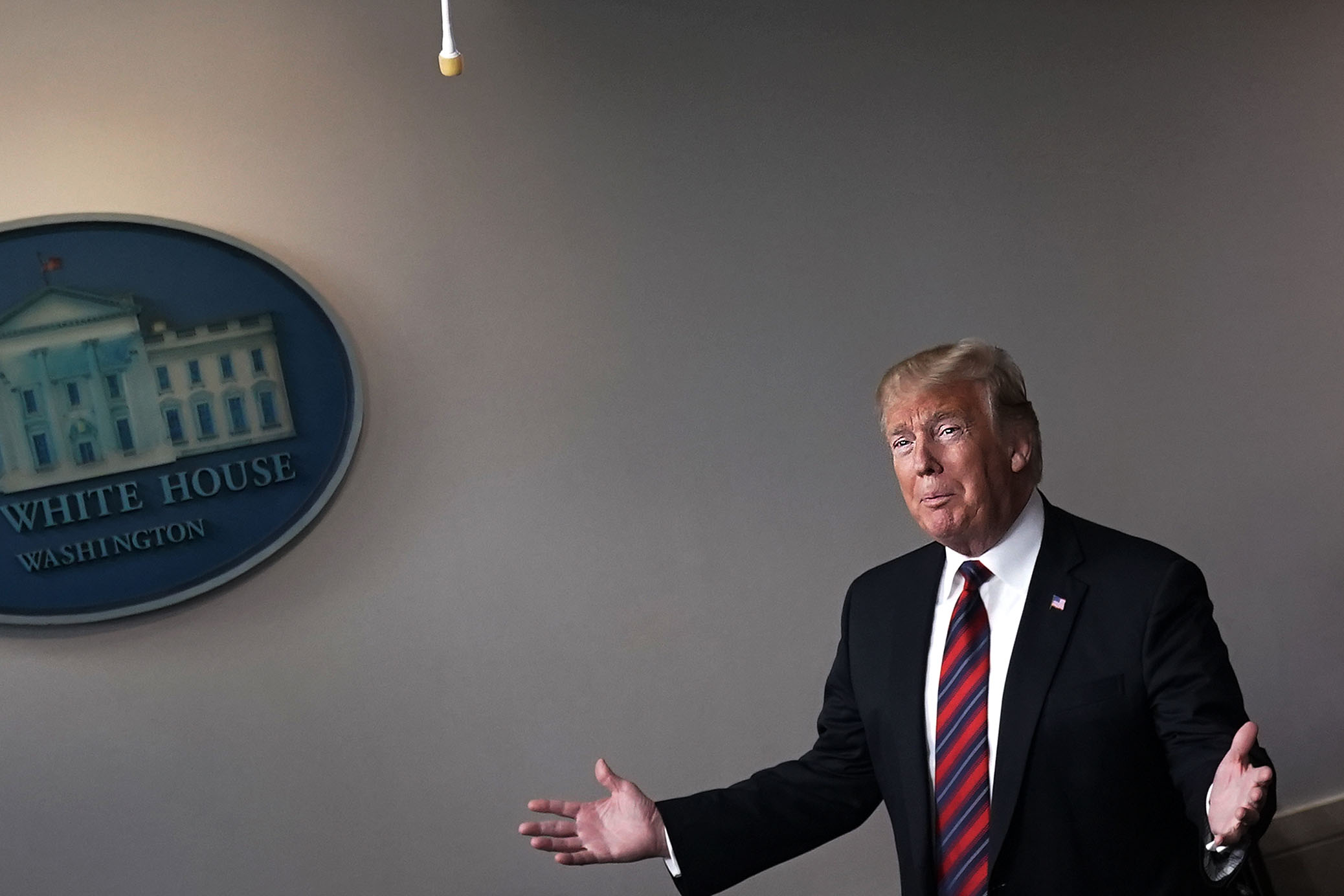 U.S. President Donald Trump speaks during a surprise visit to the James Brady Press Briefing Room of the White House. (Photo by Alex Wong/Getty Images)