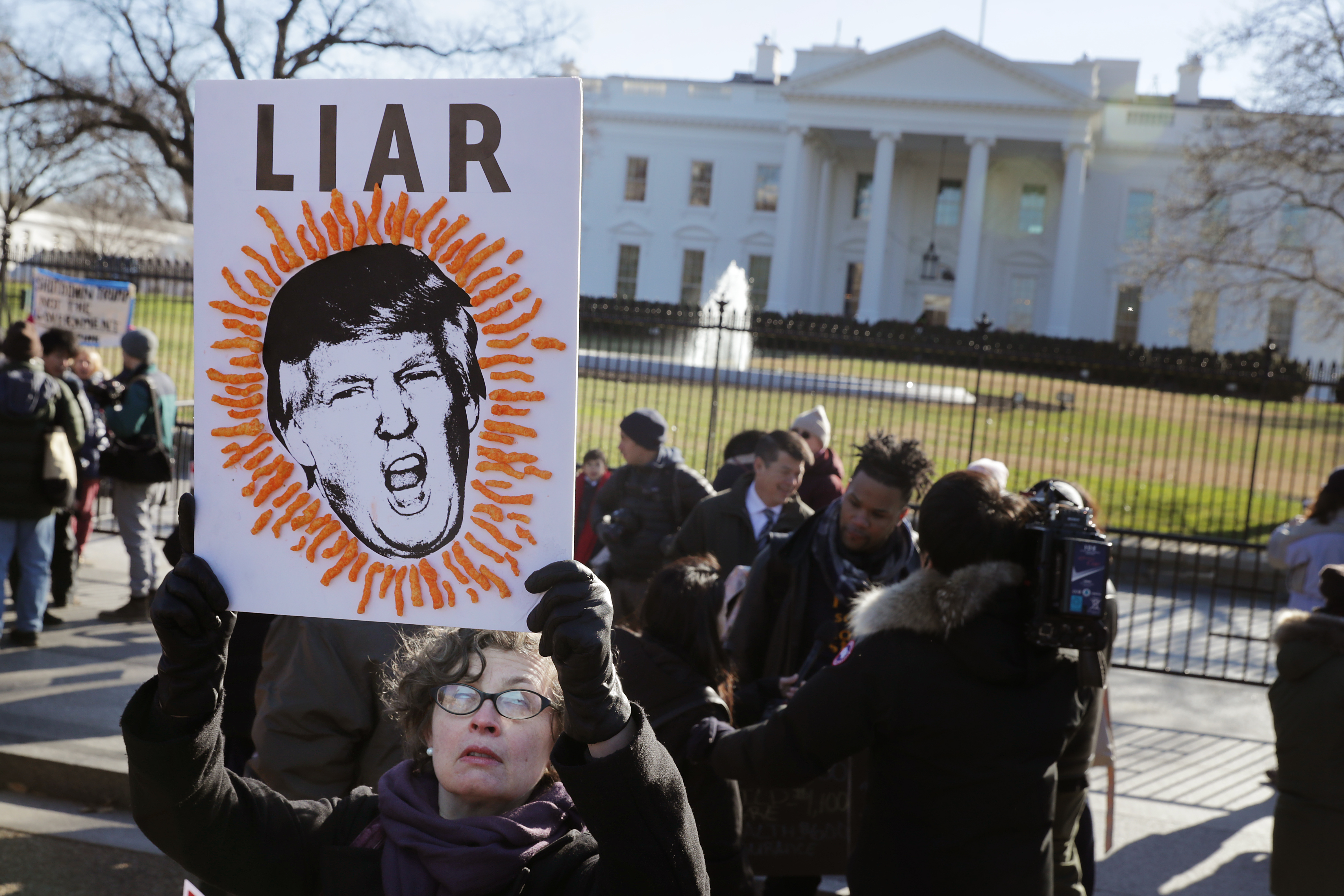 WASHINGTON, DC - JANUARY 10: Hundreds of federal workers and contractors rally against the partial federal government shutdown in front of the White House January 10, 2019 (CREDIT: Chip Somodevilla/Getty Images)