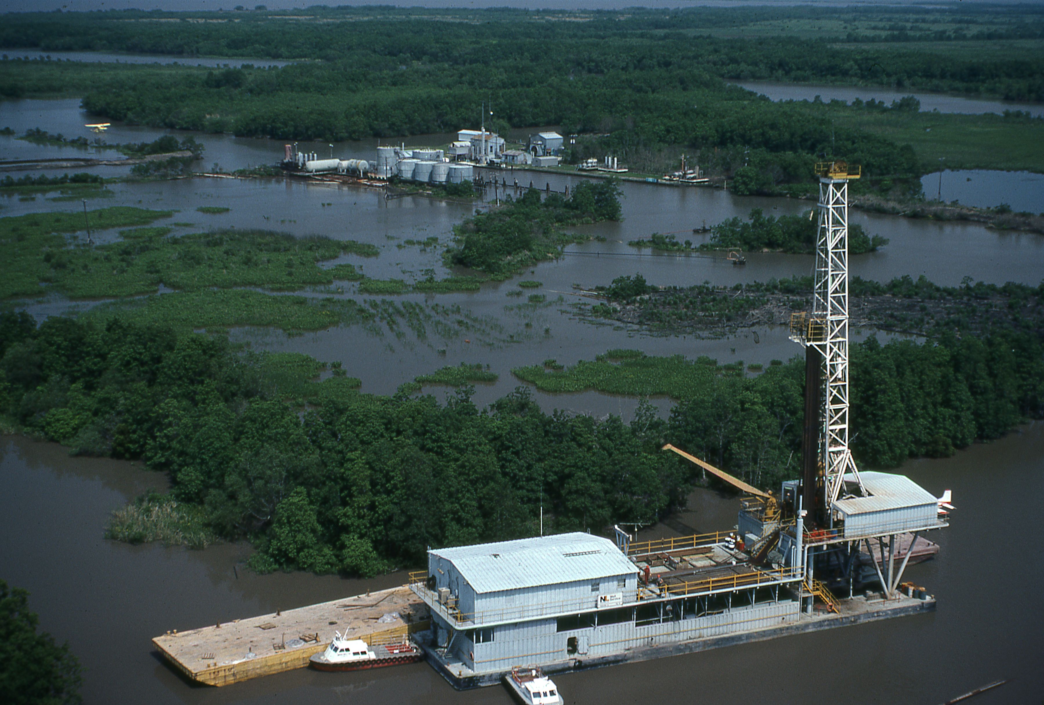 Offshore barge oil drilling rig in South Louisiana. CREDIT: Education Images/UIG via Getty Images