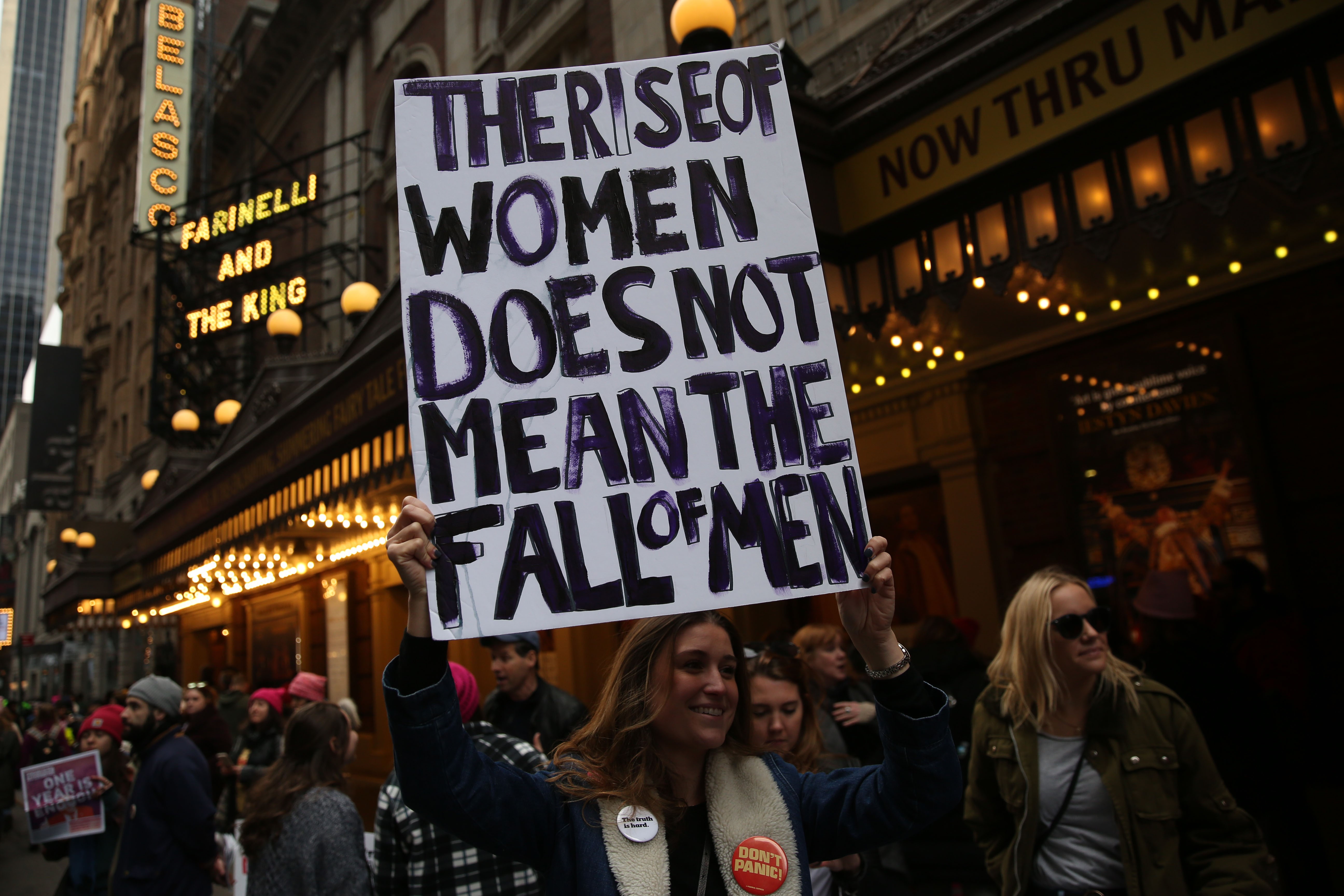 NEW YORK, USA - JANUARY 20: A woman holds a banner reading "The Rise Of Women Does Not Mean The Fall Of Men" during the Women's March against U.S. President Donald J. Trump on the 6th Avenue of New York, United States on January 20, 2018. (Photo by Mohammed Elshamy/Anadolu Agency/Getty Images)