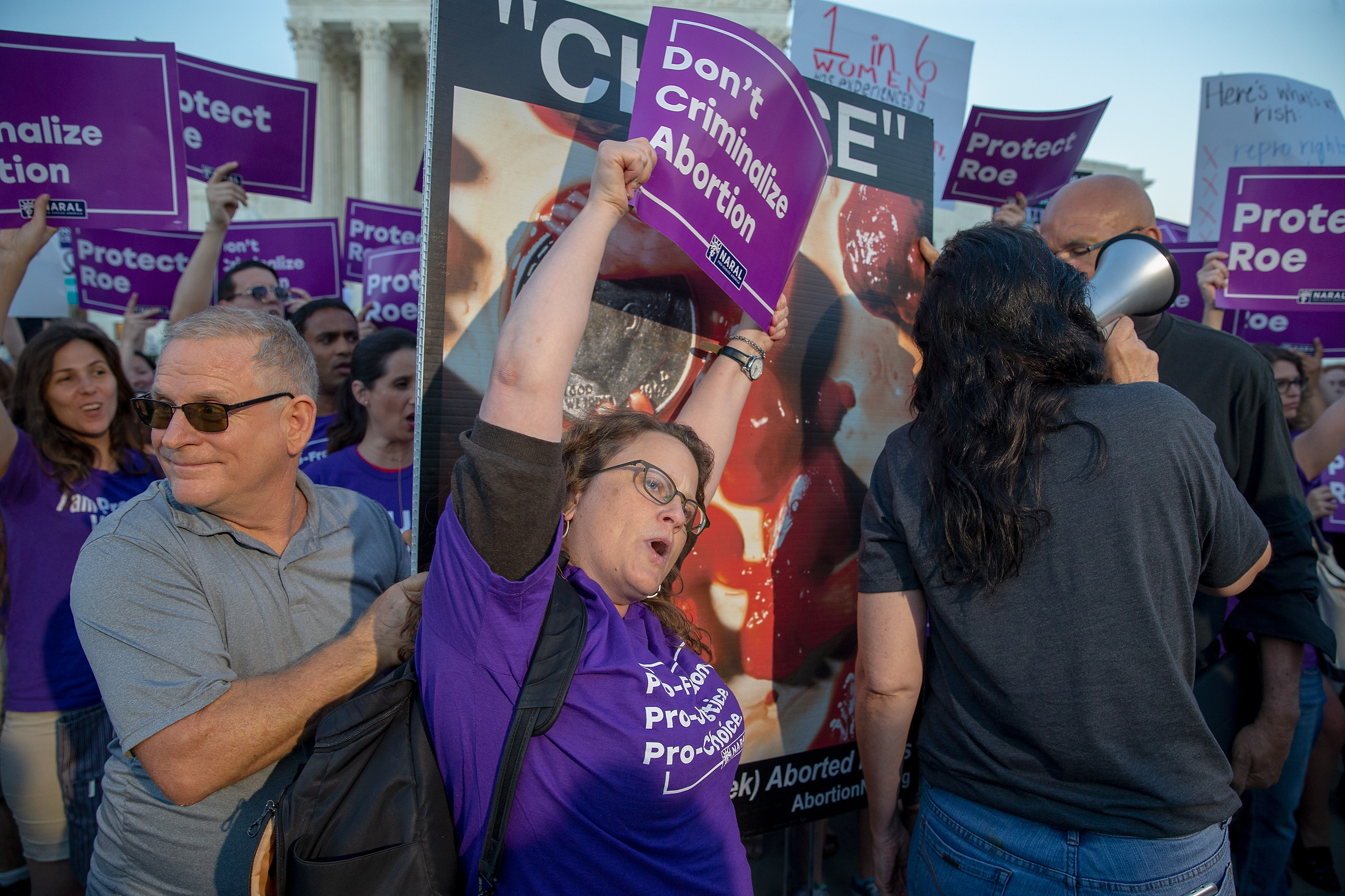 WASHINGTON, DC - JULY 09: Pro-choice and anti-abortion protesters demonstrate in front of the U.S. Supreme Court on July 9, 2018 in Washington, DC. President Donald Trump is set to announce his Supreme Court pick Monday night. (Photo by Tasos Katopodis/Getty Images)