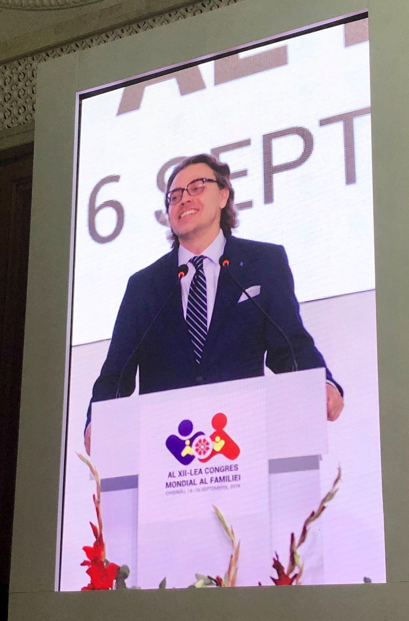 Alexey Komov, here speaking at last year's World Congress of Families conference in Moldova, has ties to multiple American organizations. CREDIT: CASEY MICHEL