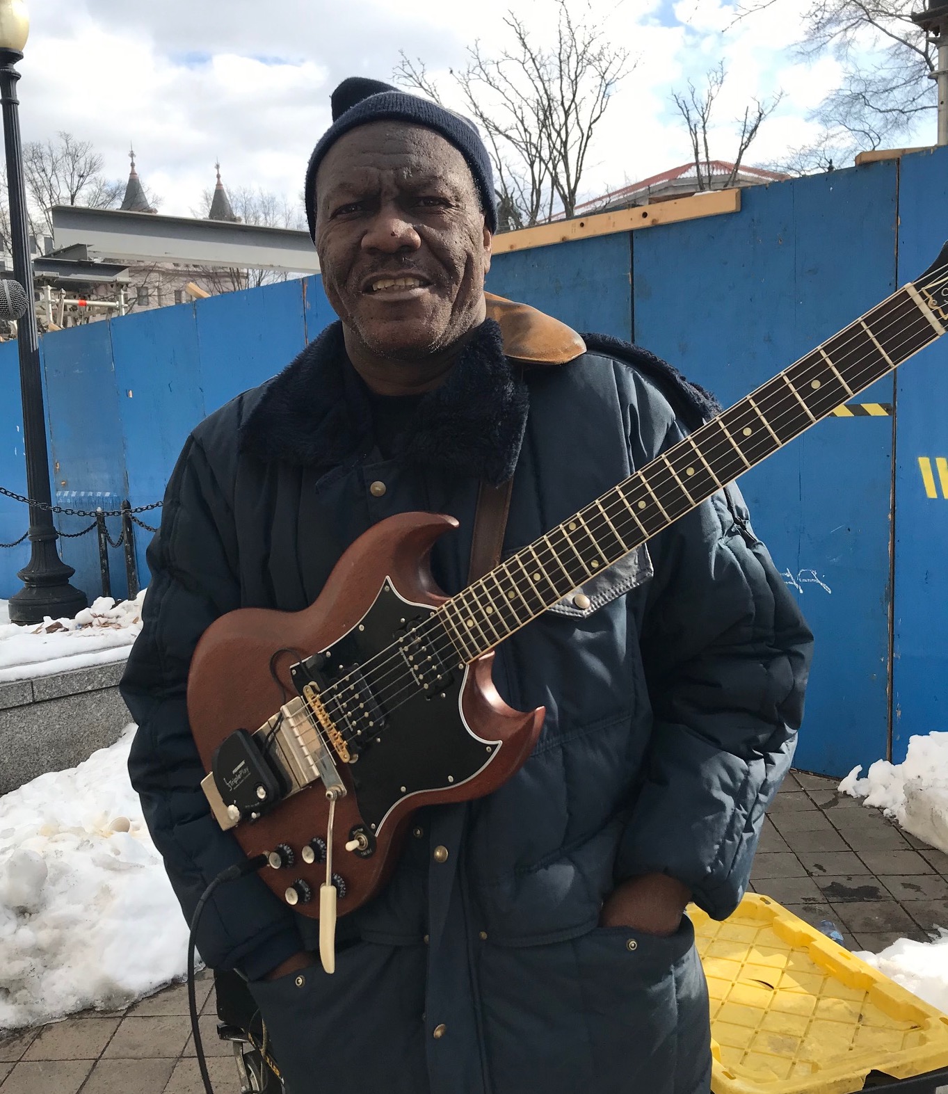 Performer Tony Covay sang as people waited in line for lunch on January 16, 2019. CREDIT: Casey Quinlan